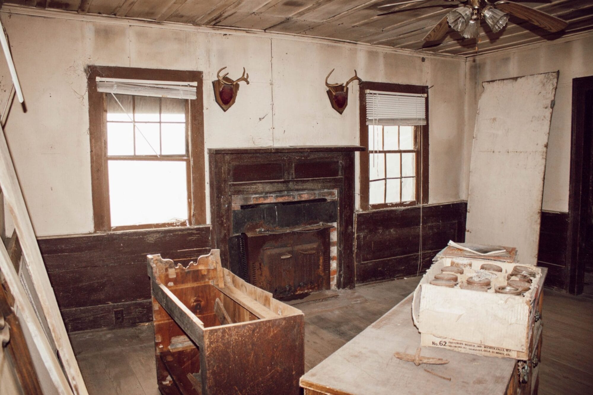 original farmhouse living room before renovation