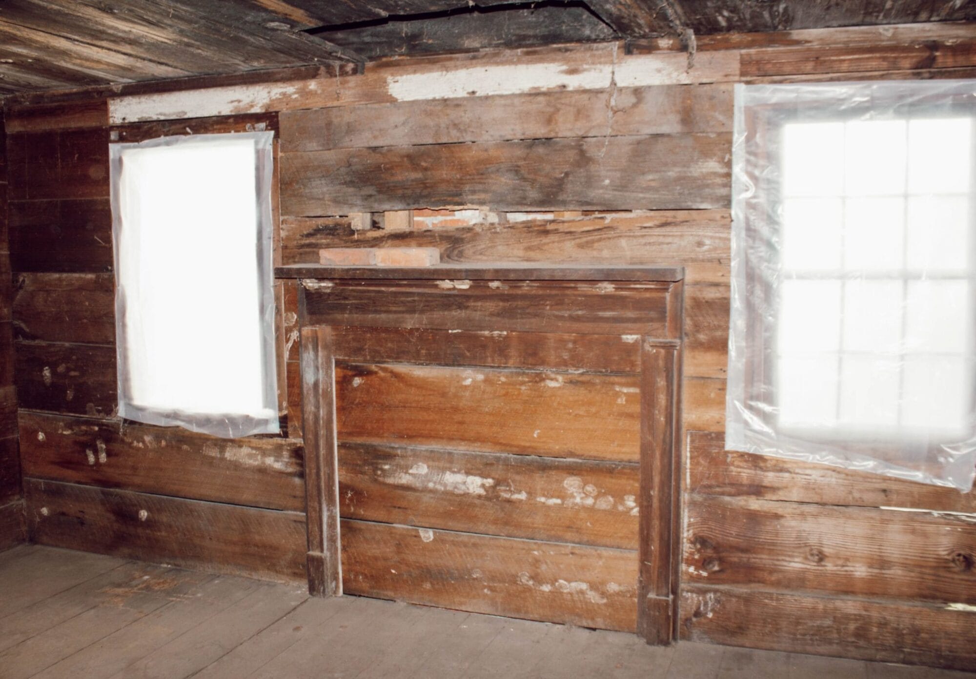original mantle piece with original shiplap walls