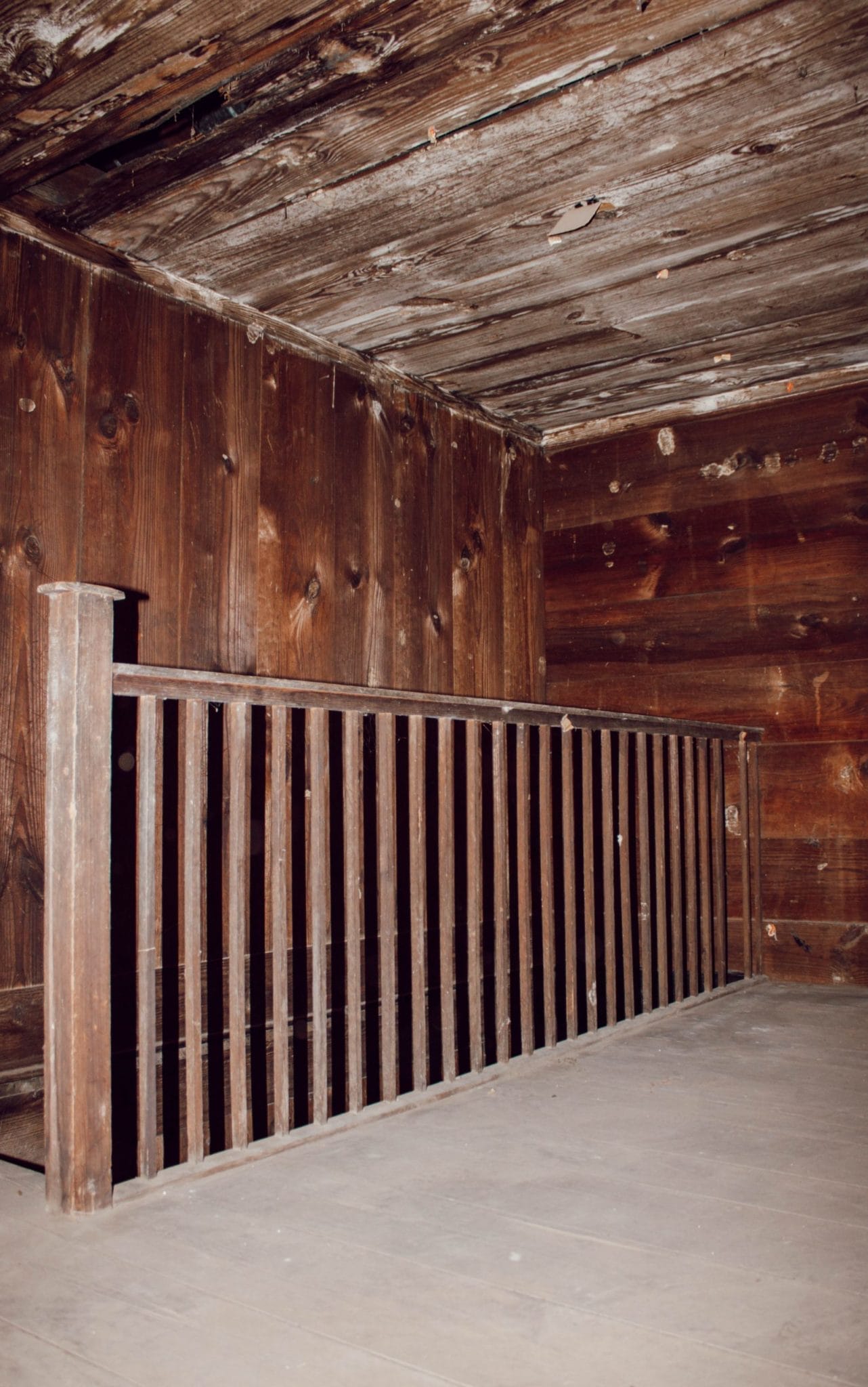 stair railing inside 1800's NC farmhouse original shiplap on walls