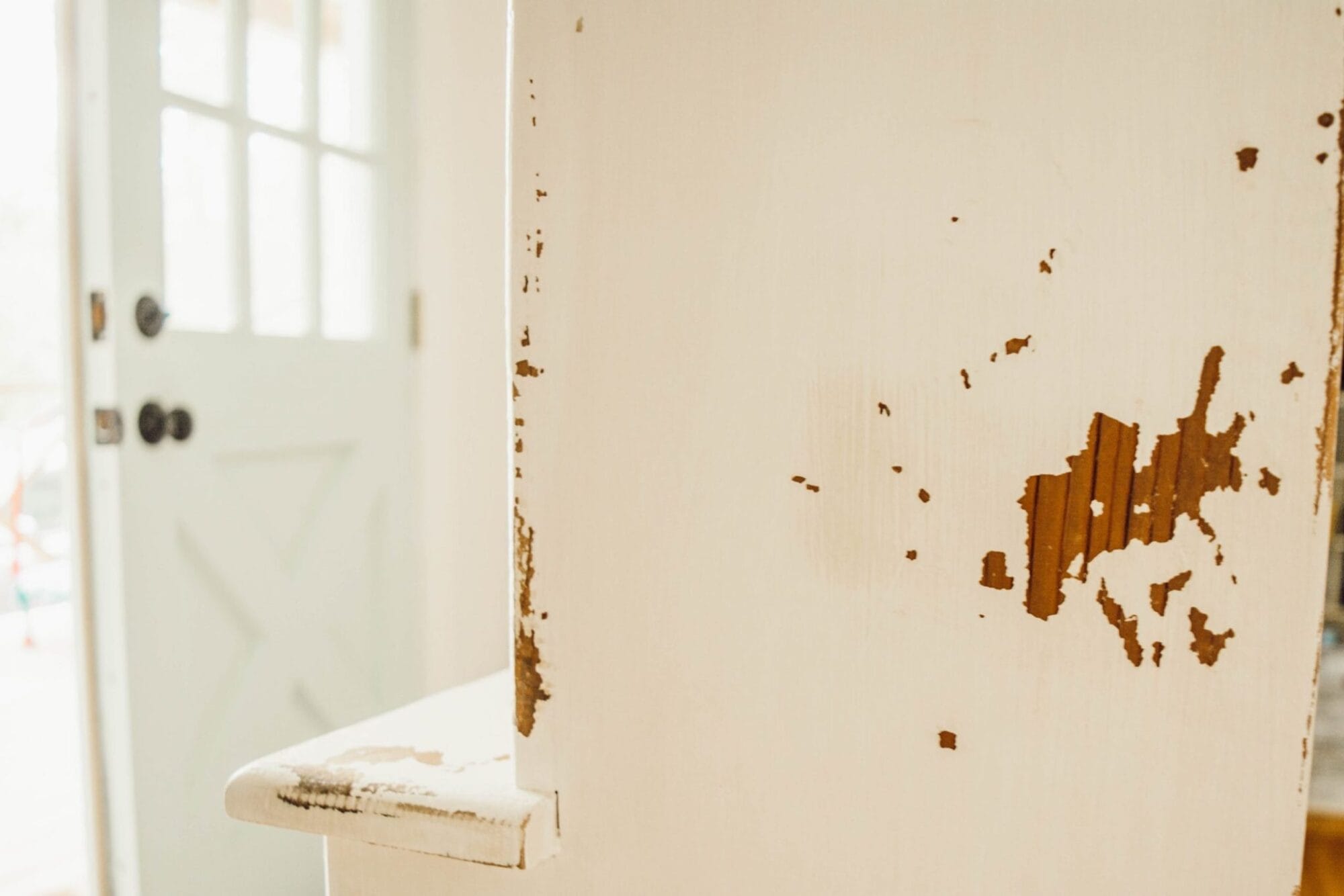 aged and weathered farmhouse style cabinet