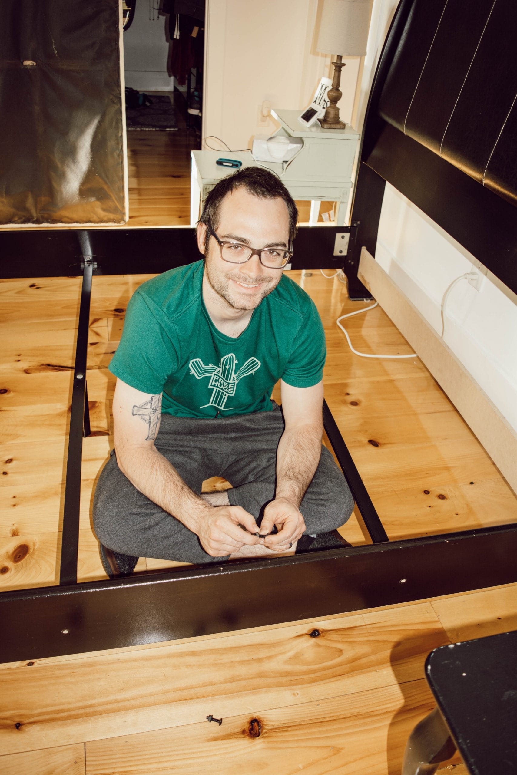 helpful husband disassembling bedframe