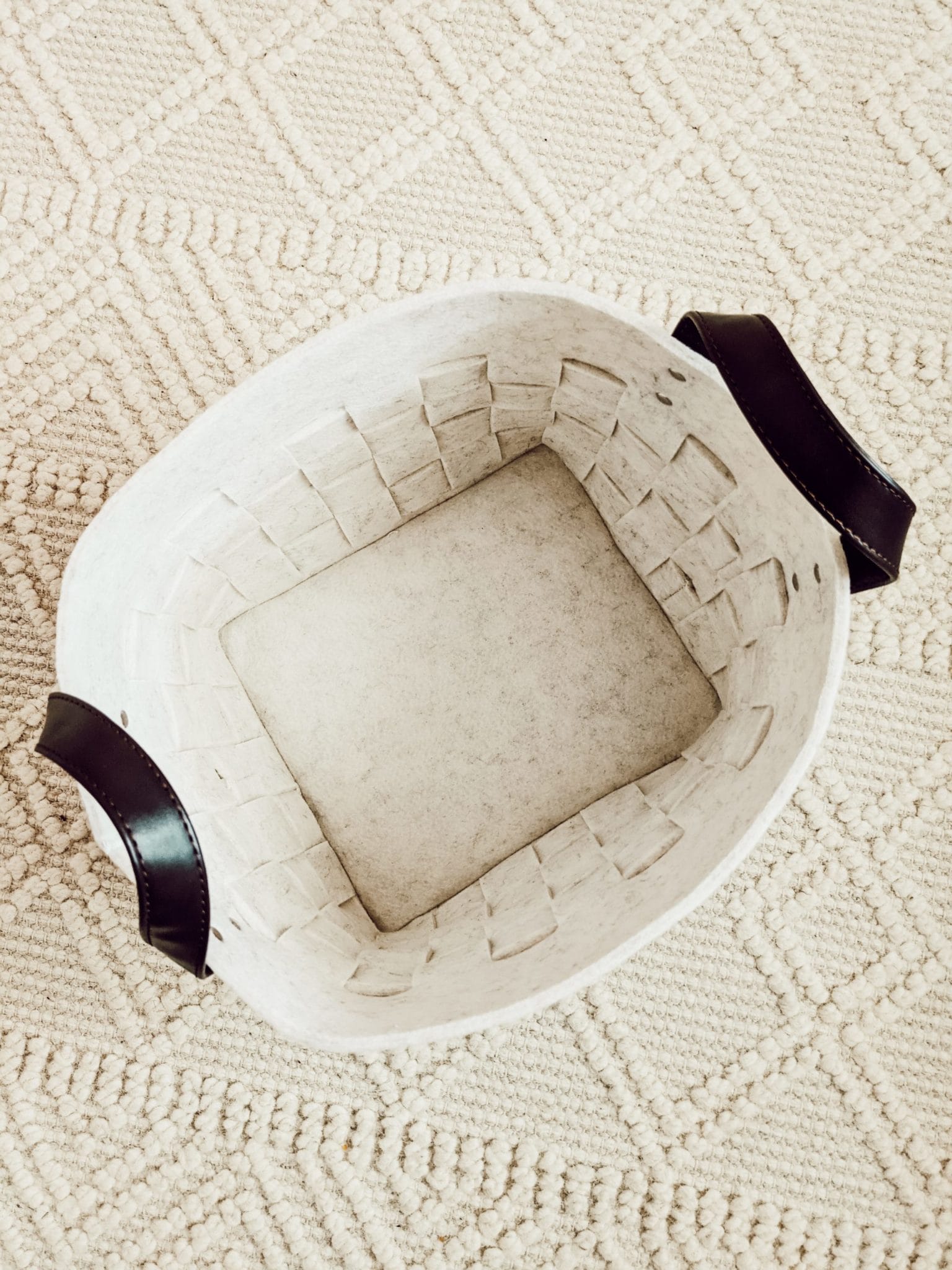 neutral textured storage bin that fits the cube organizers