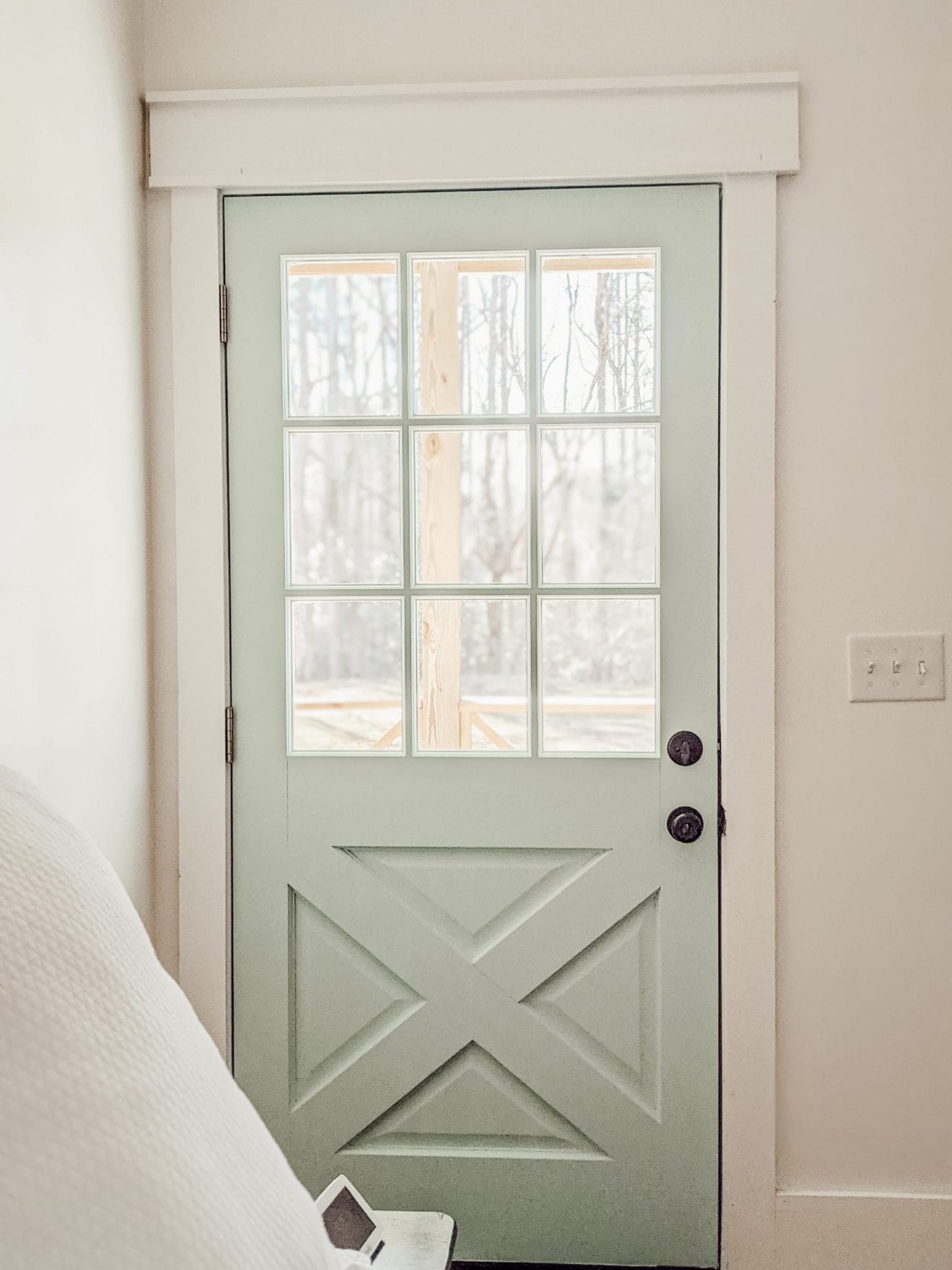 blue farmhouse door with X design
