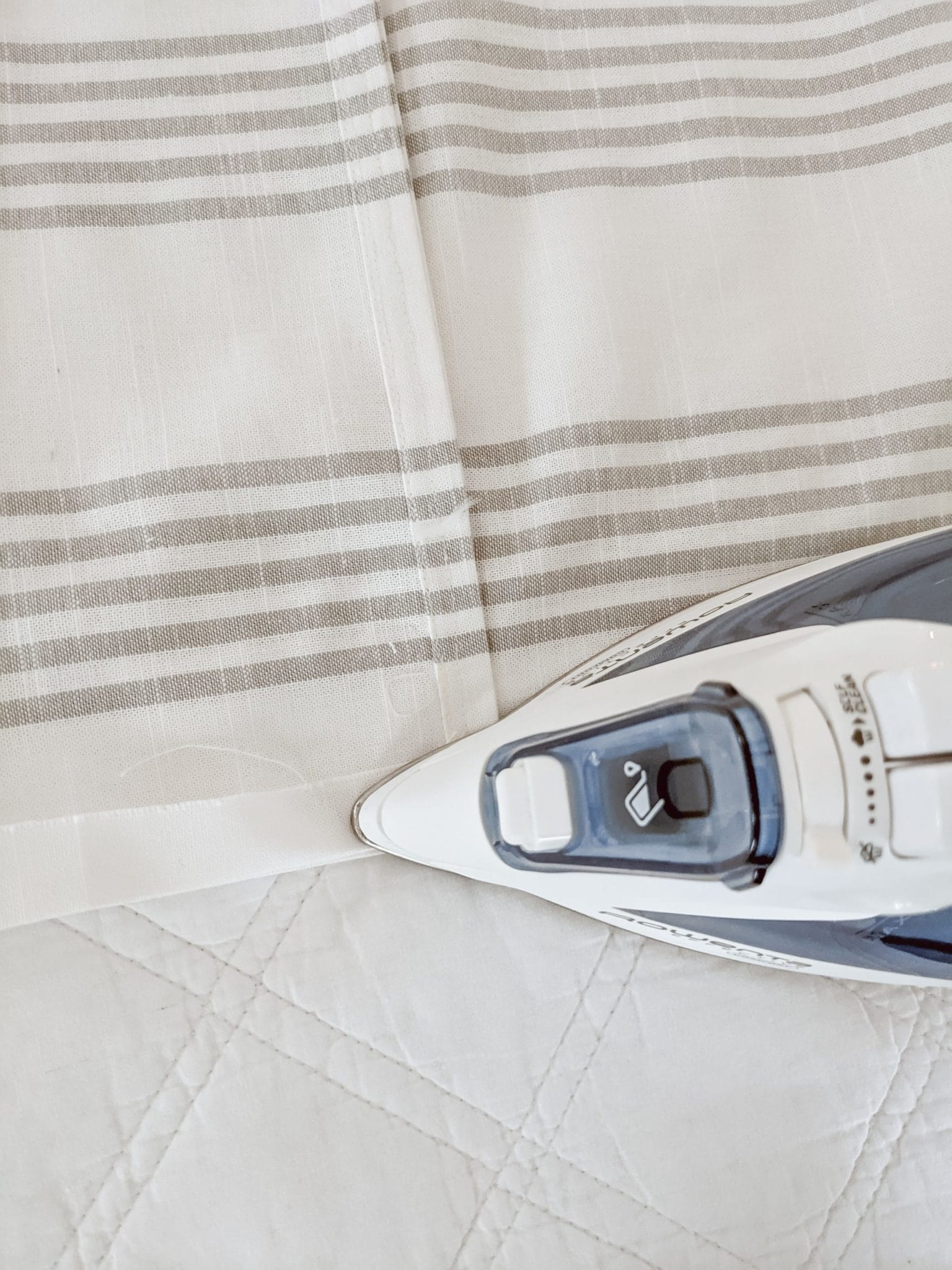 ironing the hem of a pillow cover