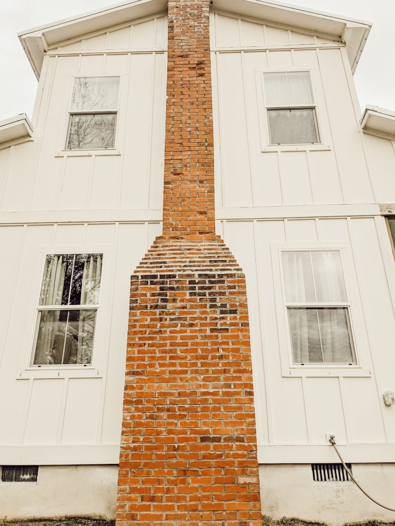 white farmhouse exterior from the Old House Love Letters series