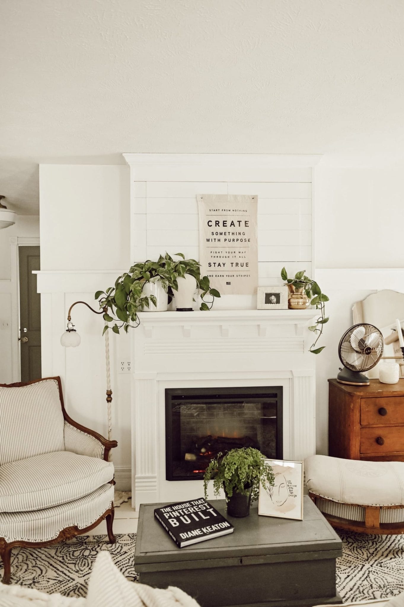 Liz Marie Galvan's diy fireplace with electric insert and hidden tv idea for our farmhouse fireplace project