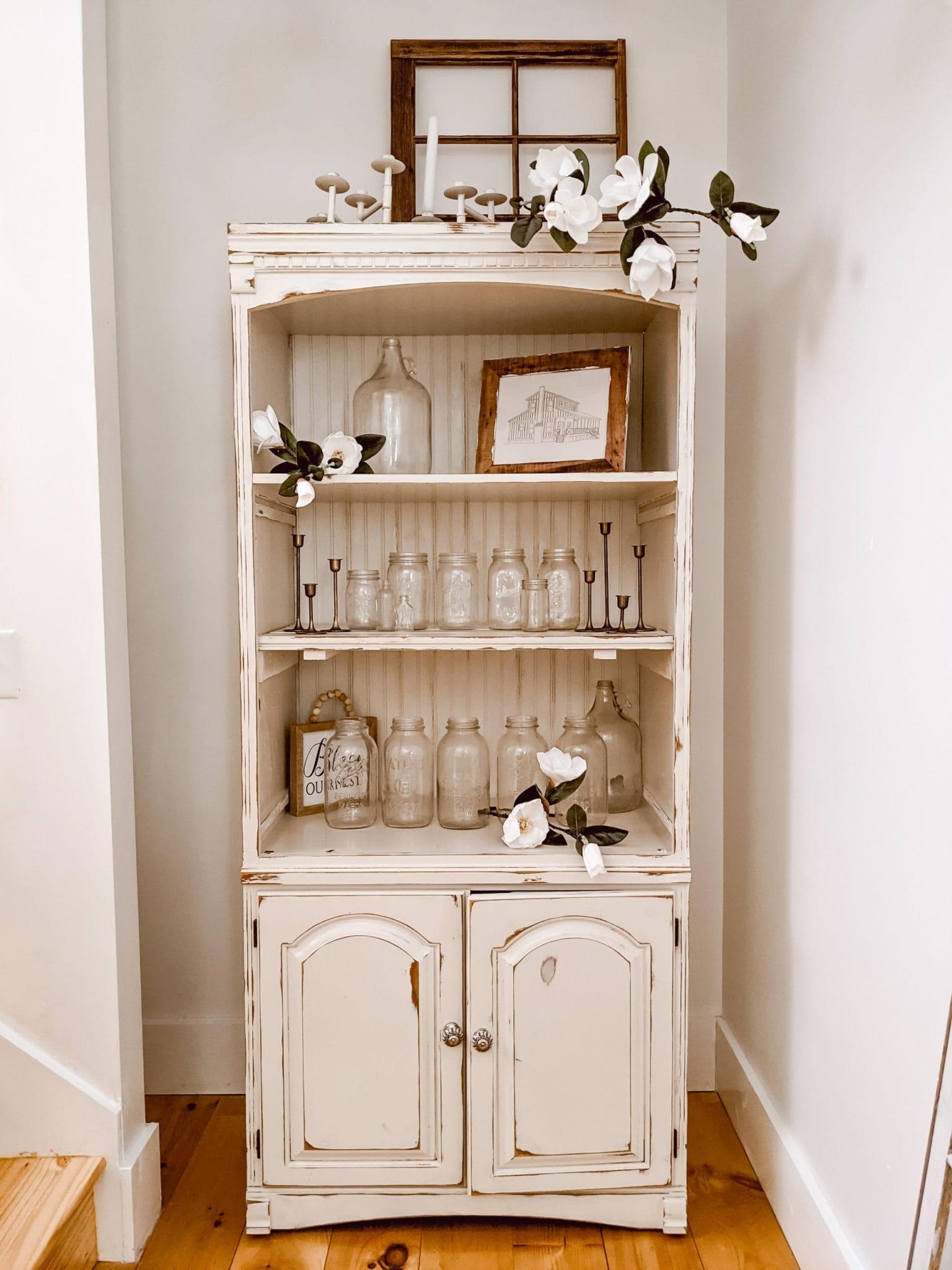 chippy white farmhouse cabinet