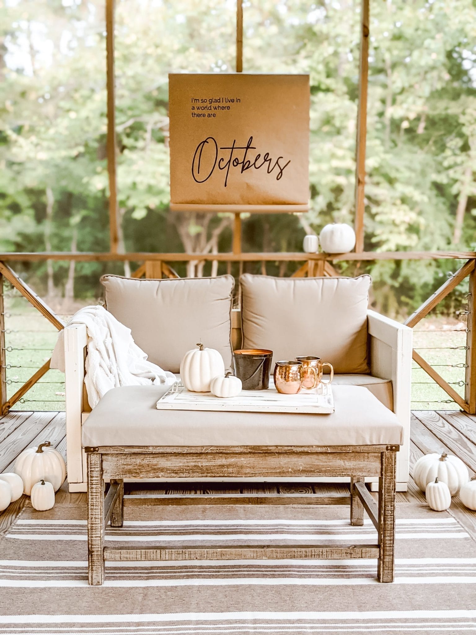fall decor on screened in porch