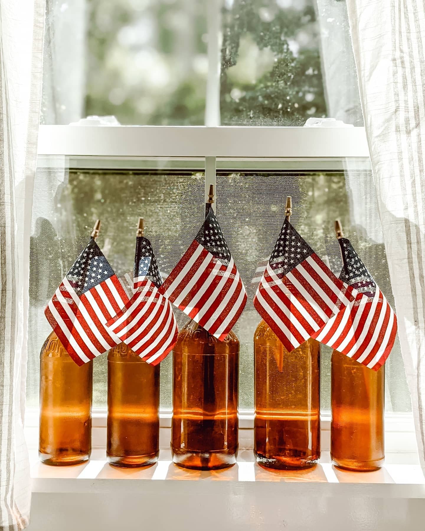 amber glass clorox bottles with vintage American flags