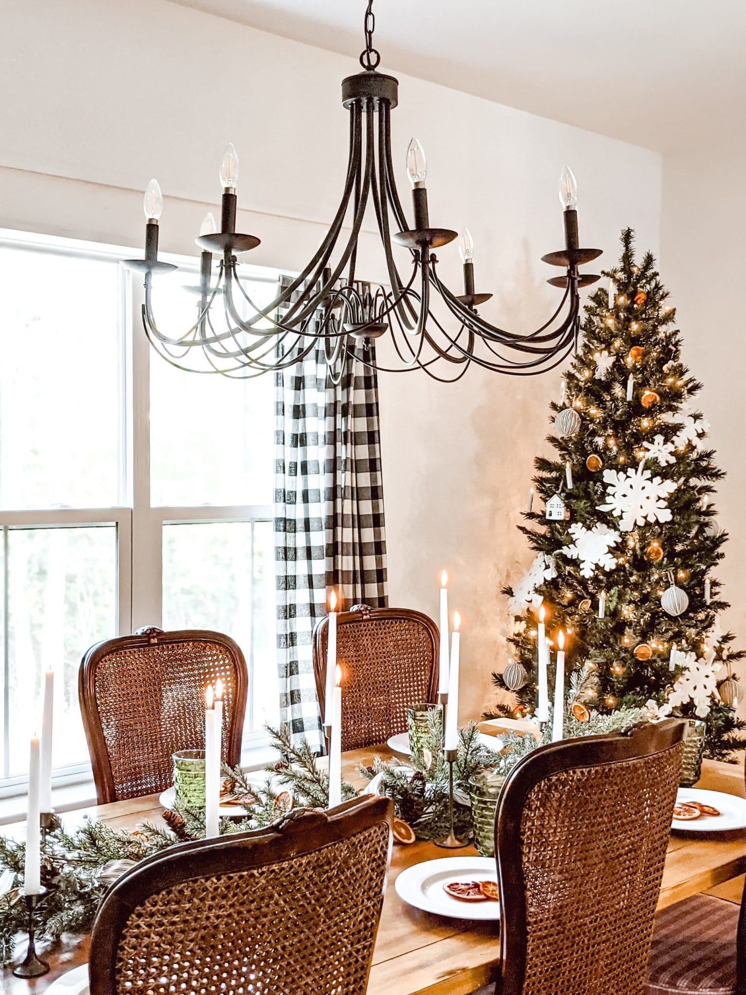 cozy farmhouse christmas tablescape and vintage caned chairs