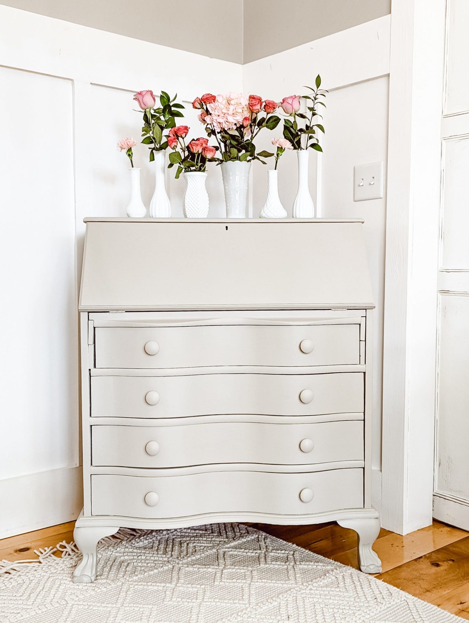 bring spring into your home with pretty pink roses and vintage milk glass vases