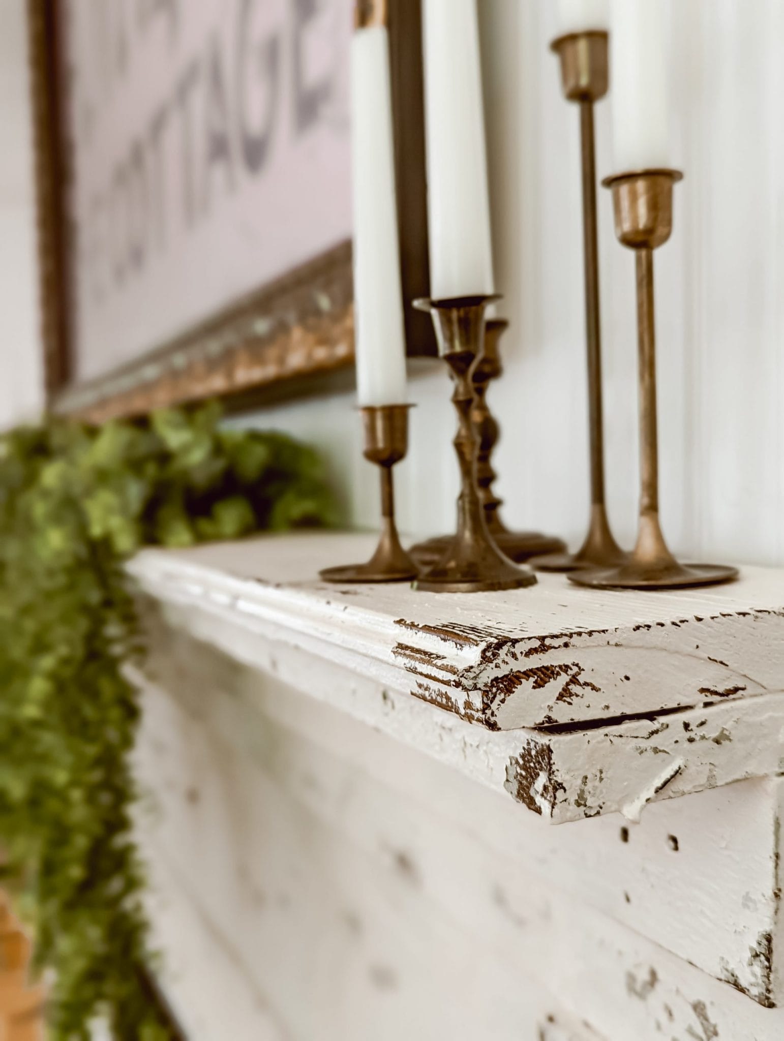 chippy white paint on antique mantel