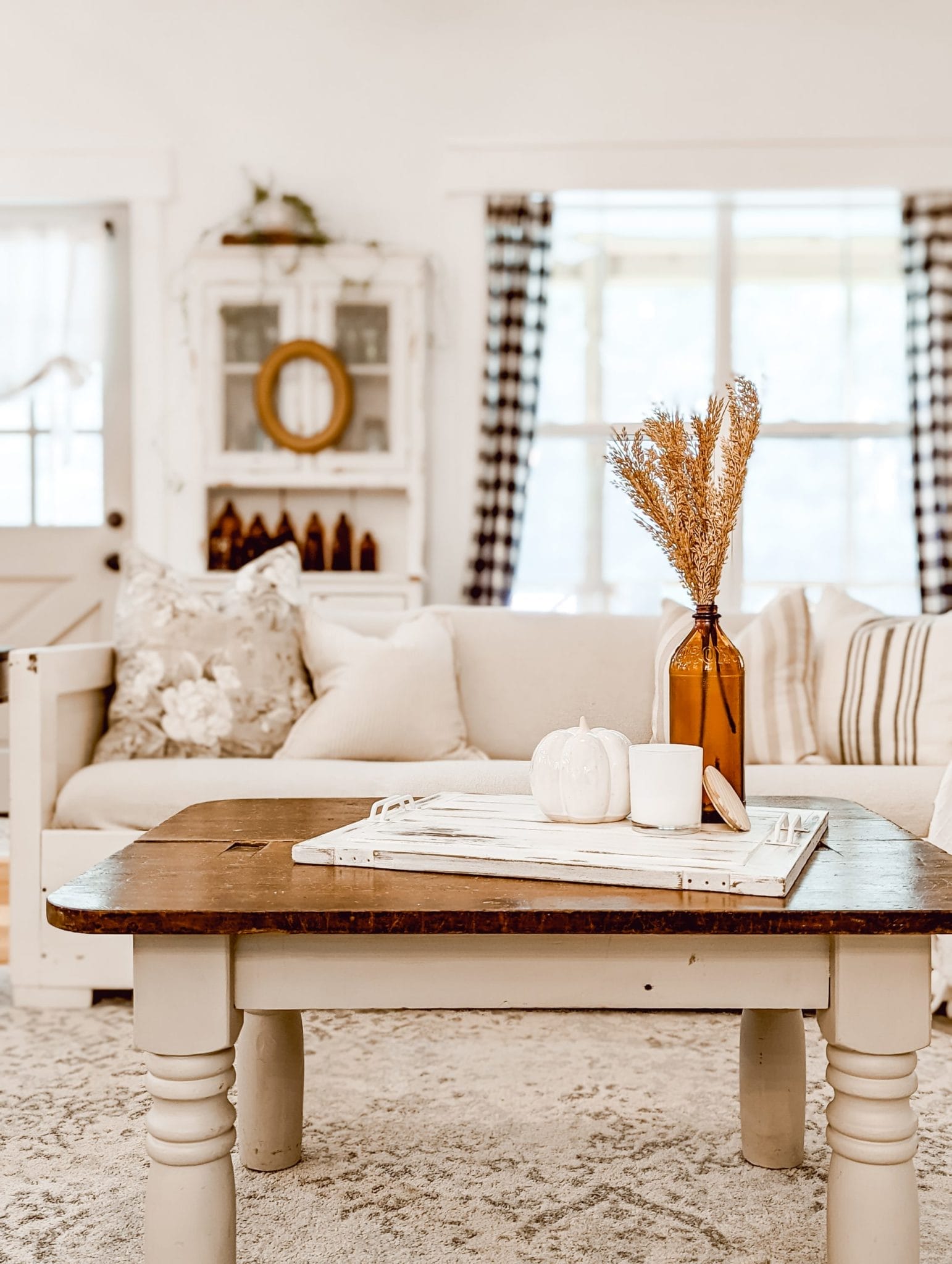 neutral fall decor in white cottage living room