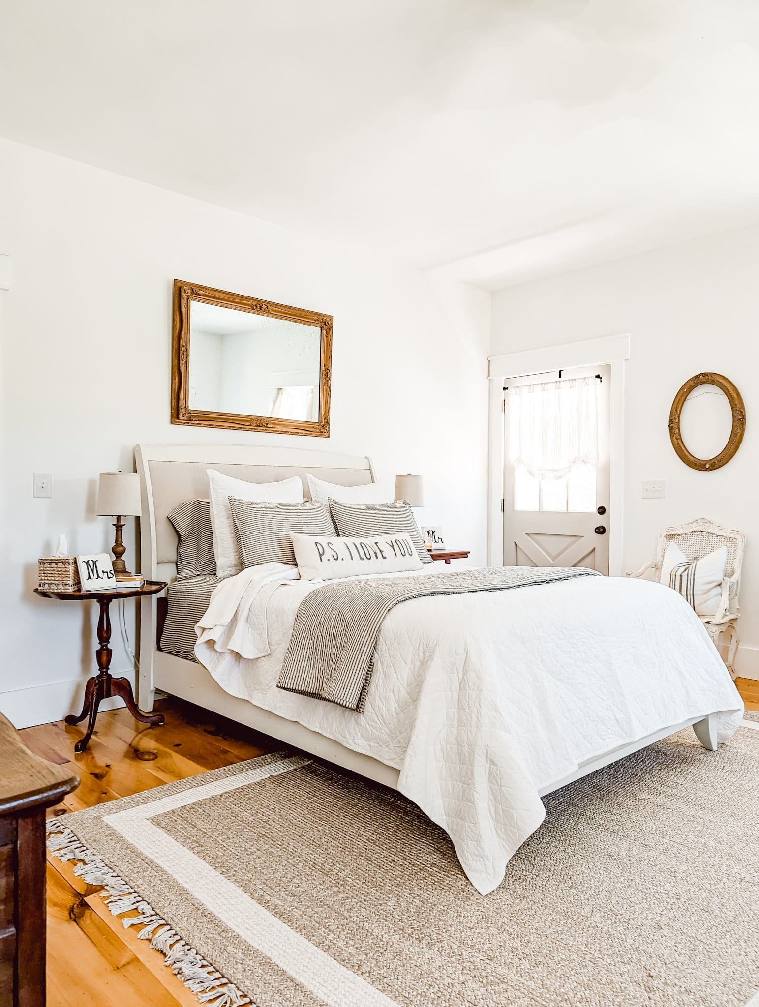 farmhouse style upholstered headboard painted with Fusion Mineral Raw Silk and covered with drop cloth fabric