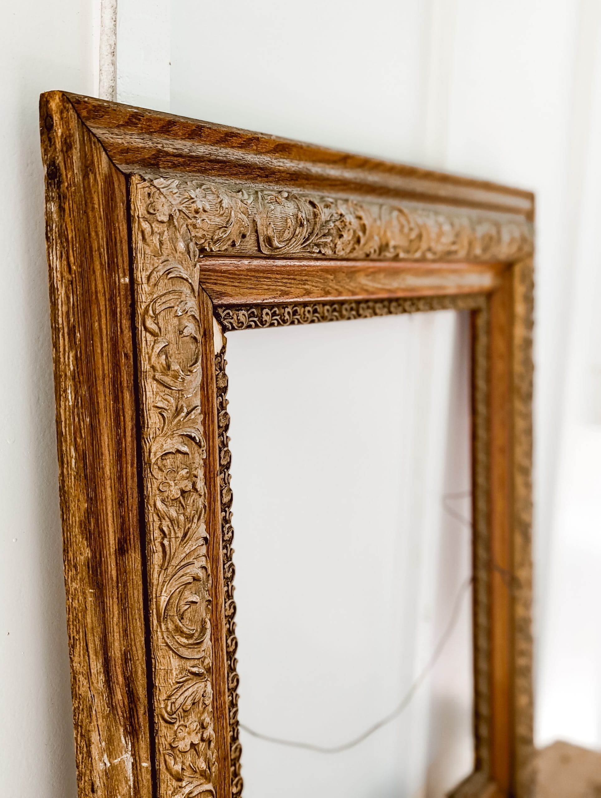 antique wood frame with gold trim detail