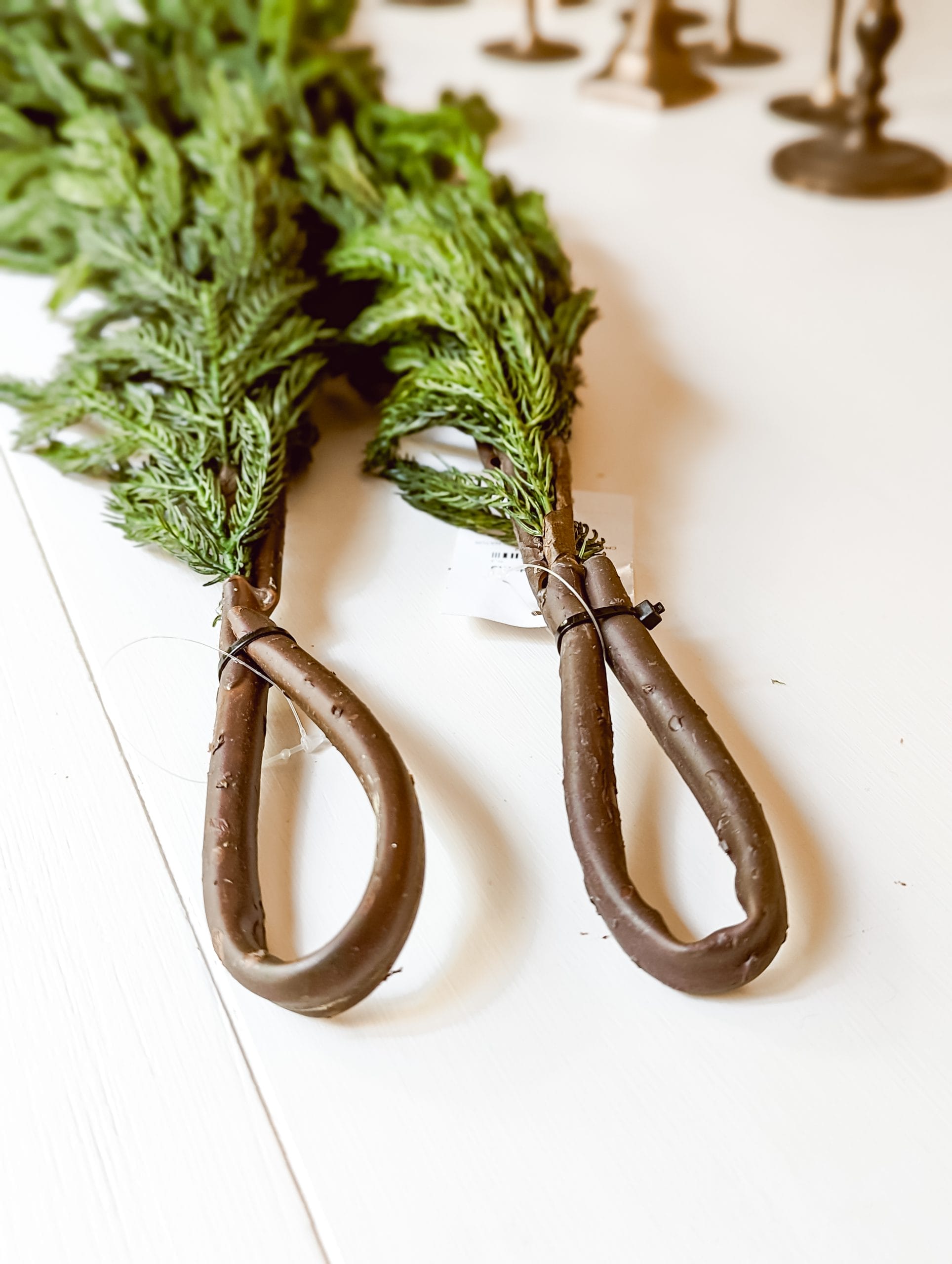 comparing afloral's real touch norfolk pine garland with kirkland's norfolk pine natural touch garland