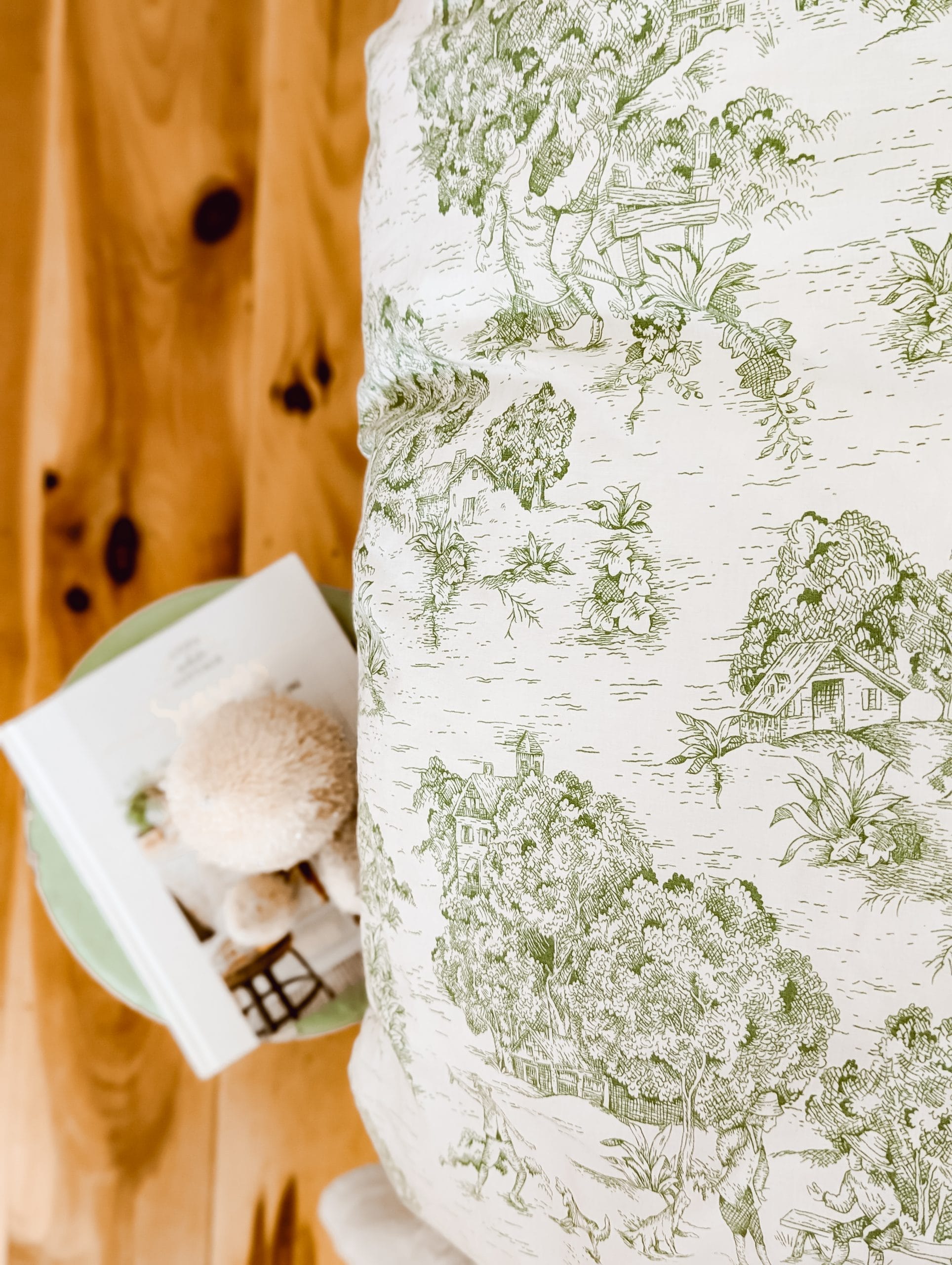 the prettiest green toile bedding from Red Land Cotton with country scenes and trees and farm life