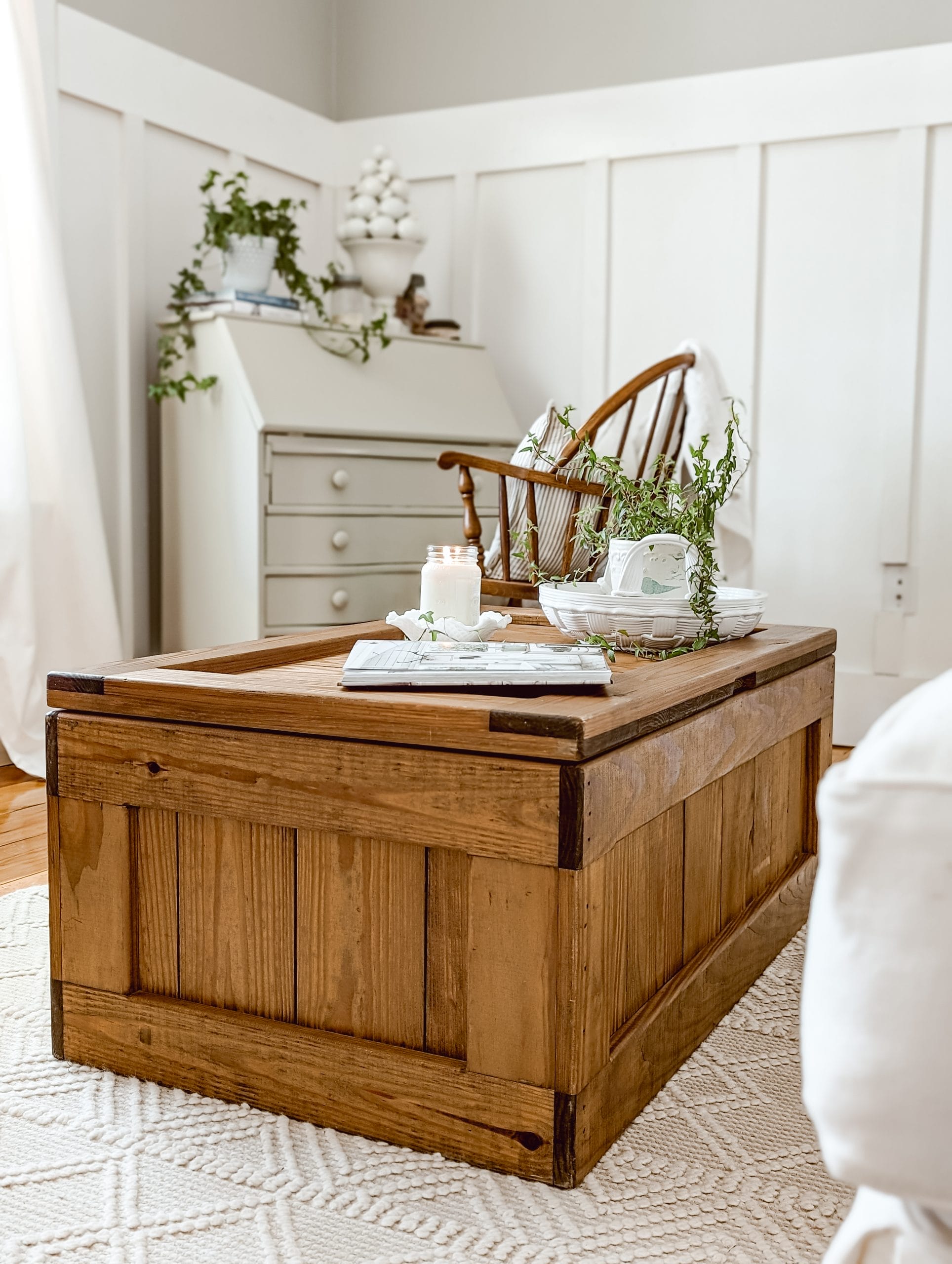 vintage "this end up" pine cargo toy chest styled as a cottage coffee table with extra linen storage for guests