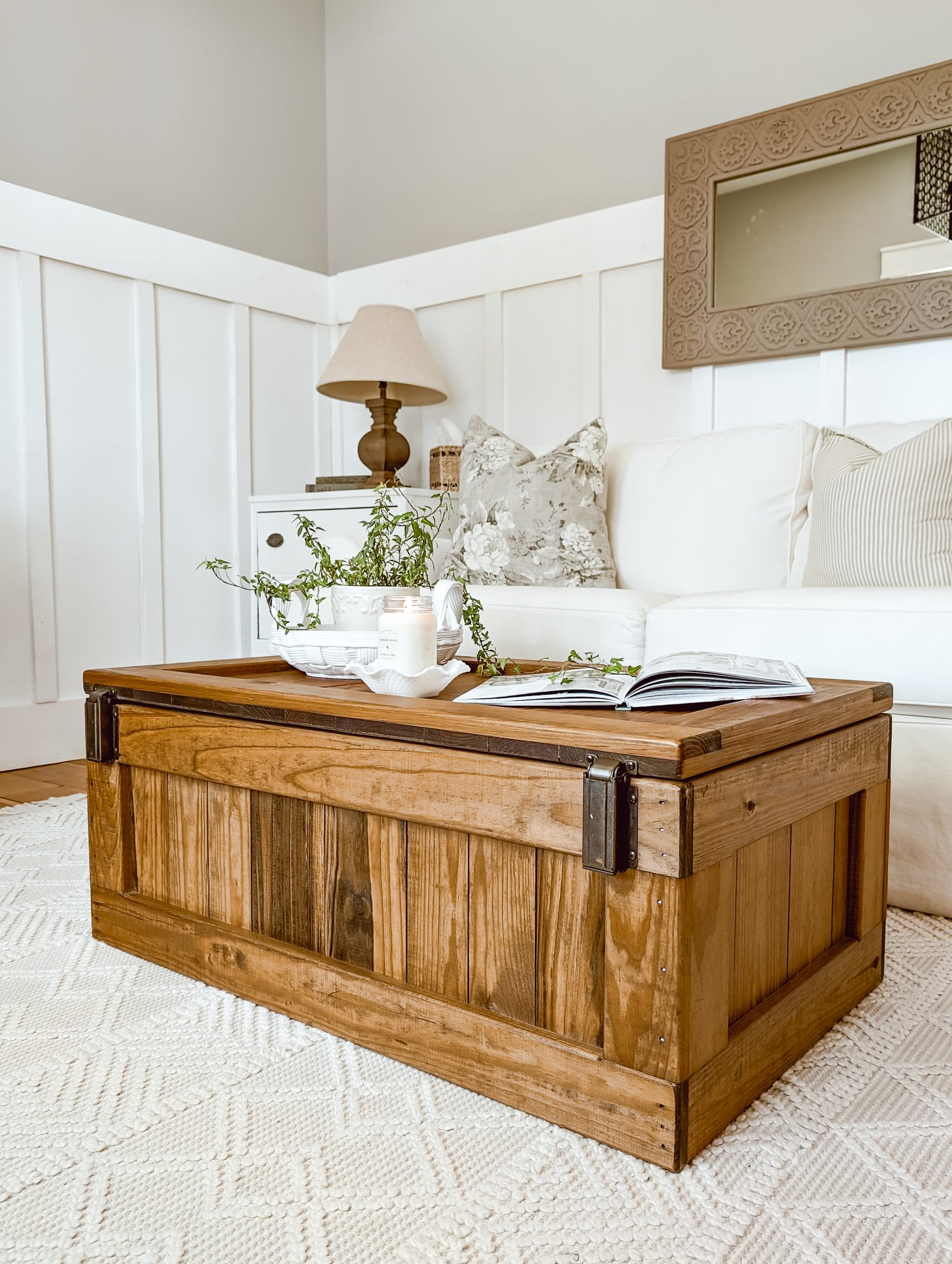vintage "this end up" pine cargo toy chest styled as a cottage coffee table with extra linen storage for guests