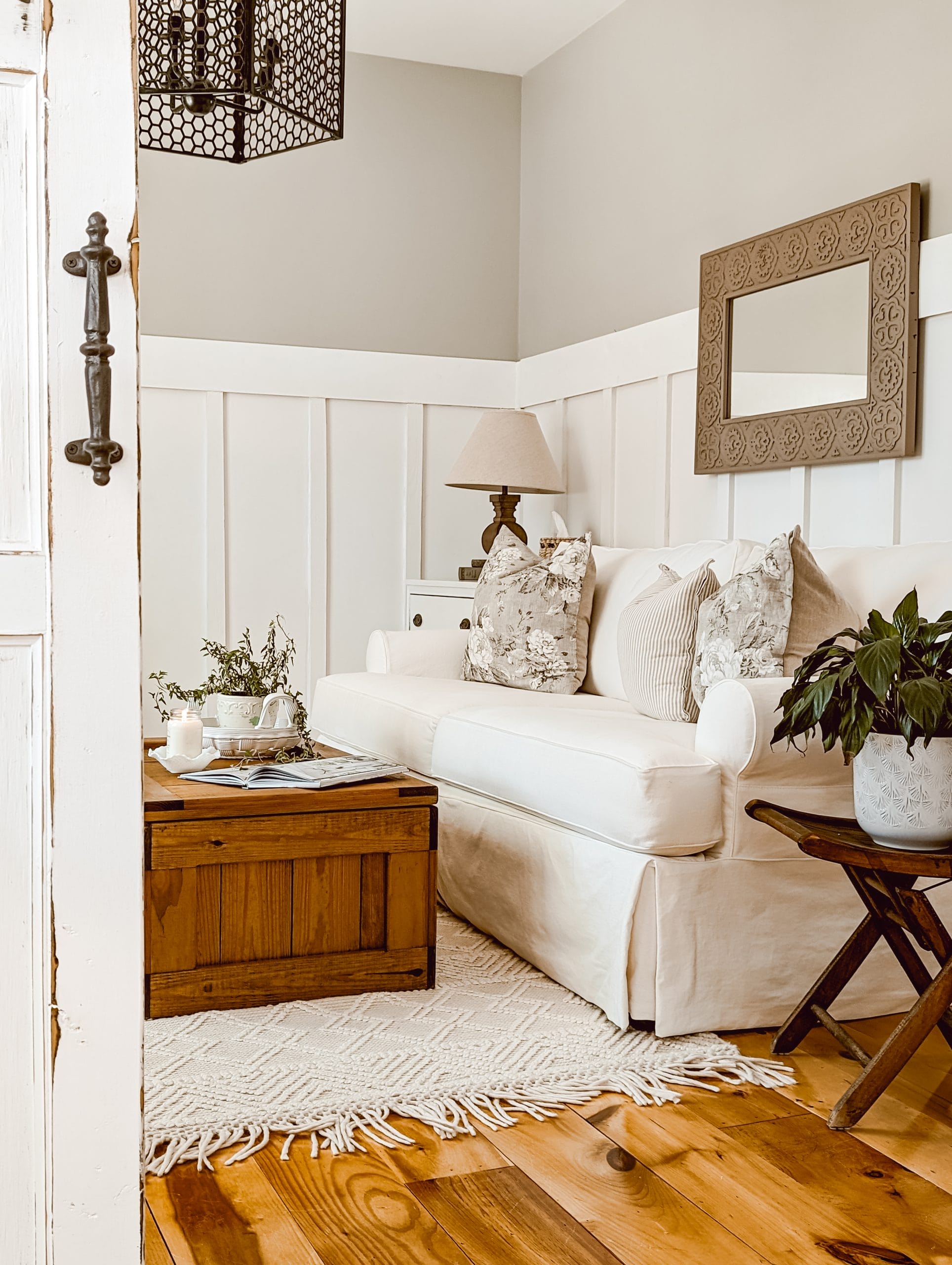 thrifted "this end up" toy chest as a coffee table in a cottage farmhouse style sitting room