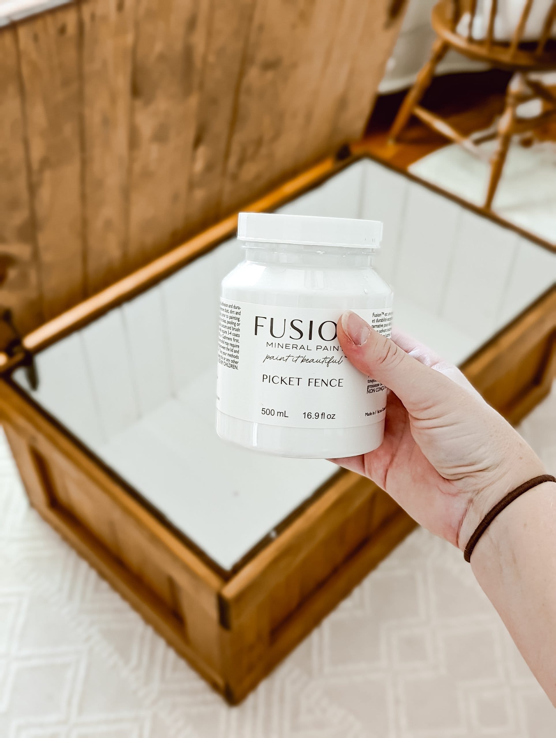 paint is an easy way to update a vintage "this end up" pine cargo toy chest