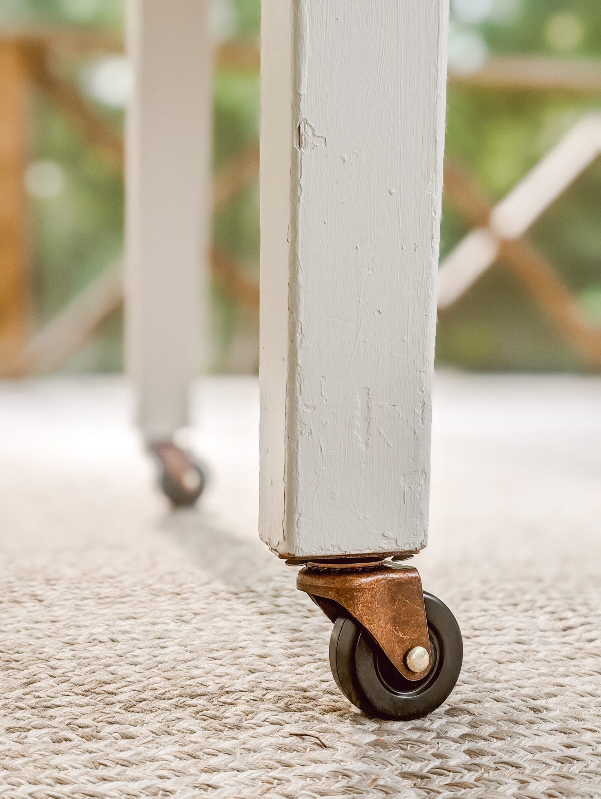 The Easy Way to Add Caster Wheels to a Wood Table White and Woodgrain