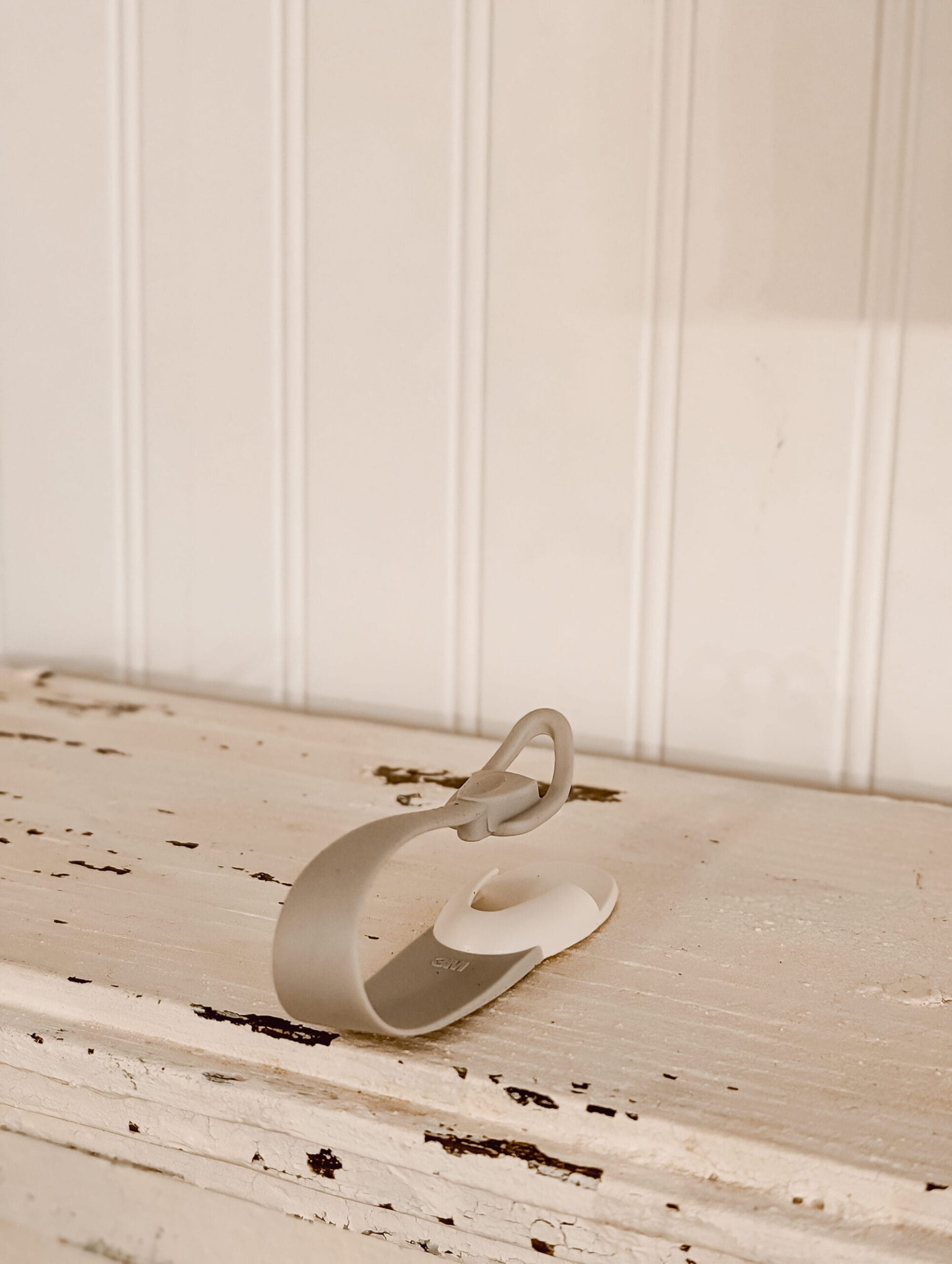 attaching a command cord bundler to a fireplace mantel