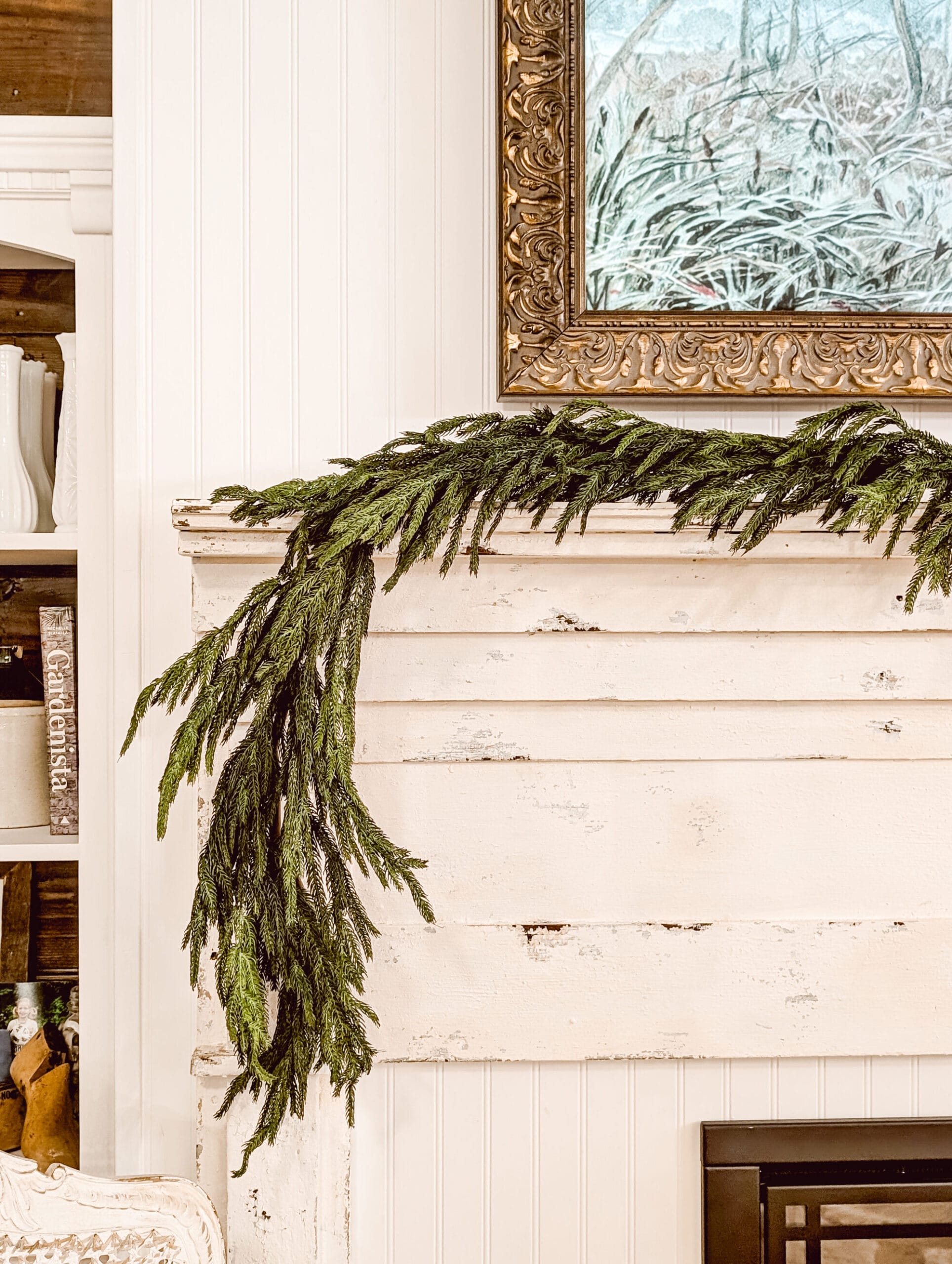 using command cord bundlers to hang a Christmas garland on a mantel