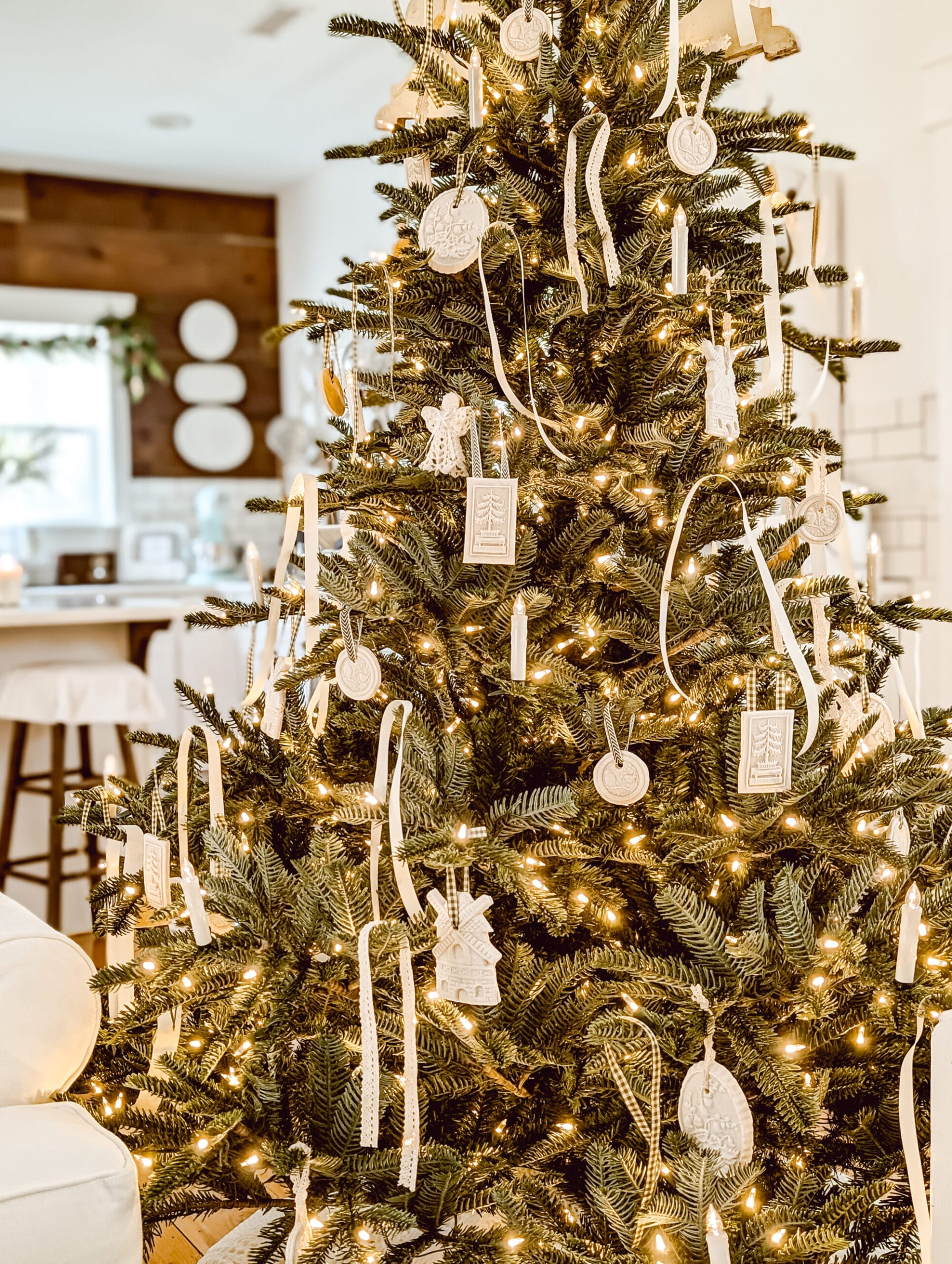 Balsam Hill European Fir tree with vintage salt dough ornaments and ribbon hung like tinsel