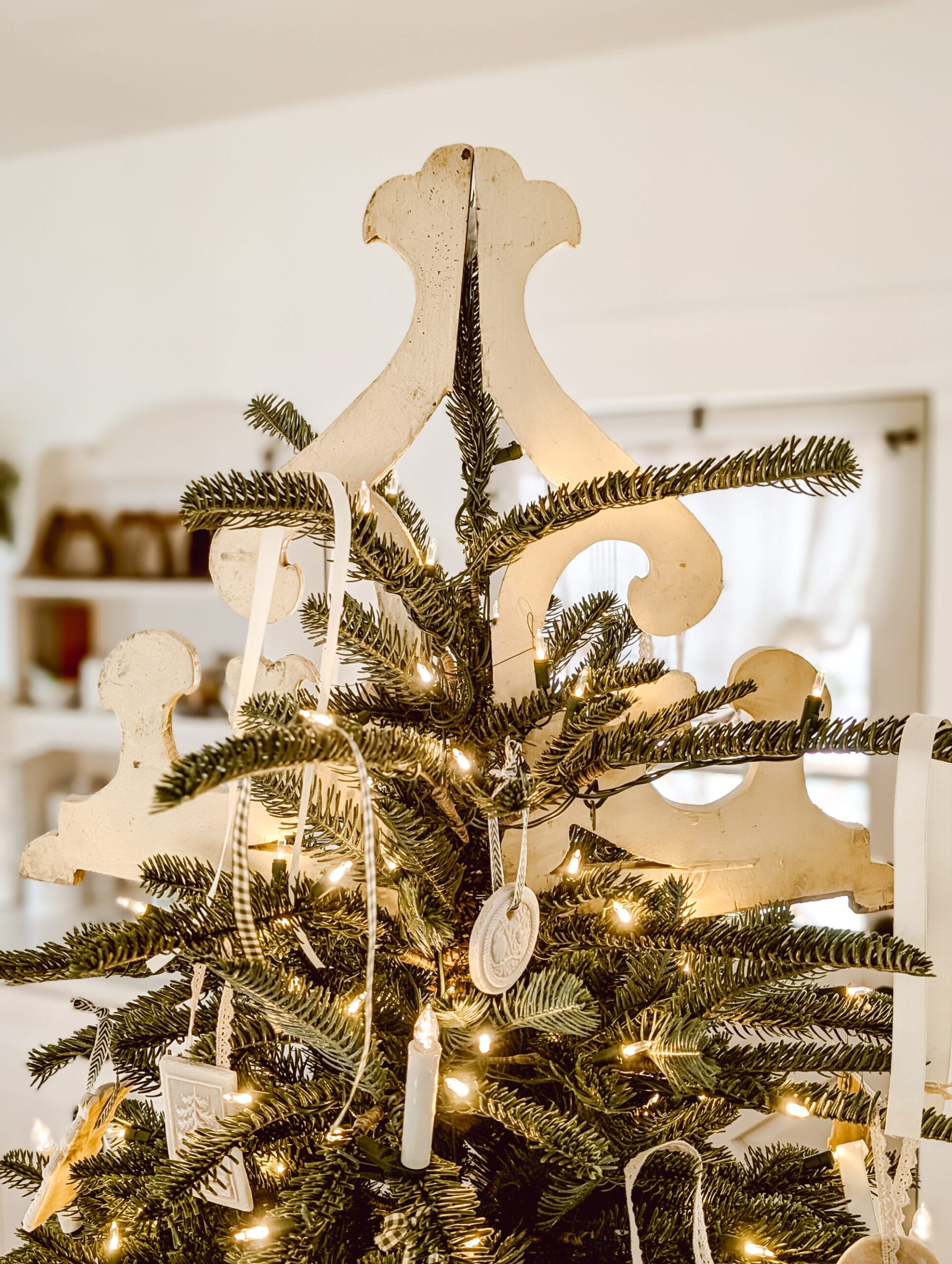 antique corbels repurposed as a tree topper for Christmas