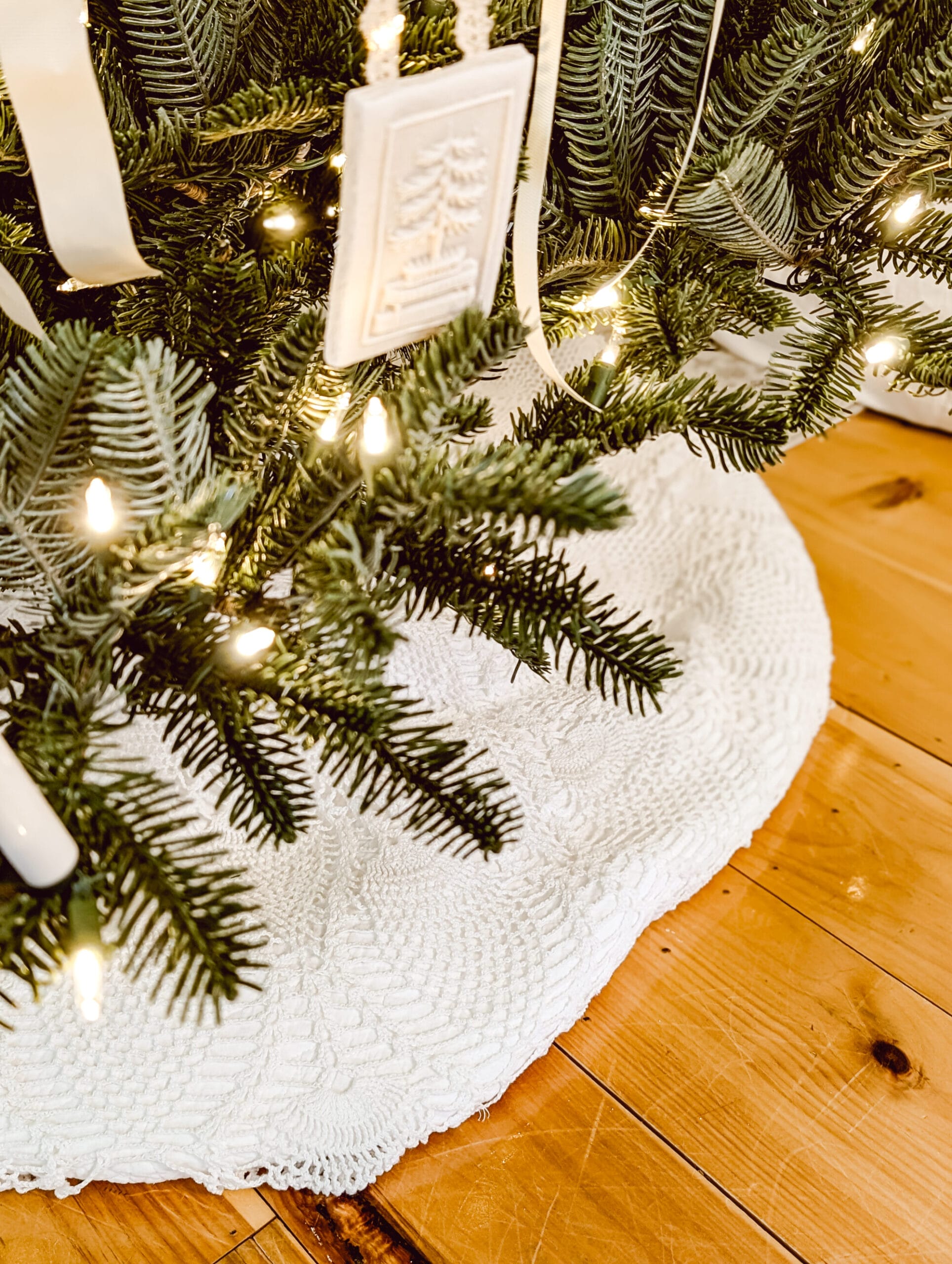 antique crocheted tablecloth styled as a vintage looking Christmas tree skirt