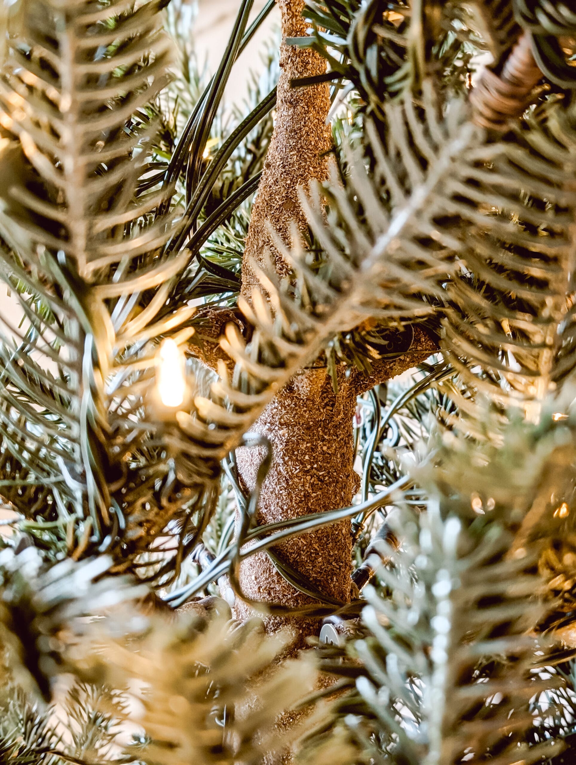 Balsam Hill's artificial Nordmann Fir Christmas tree with a very realistic tree trunk