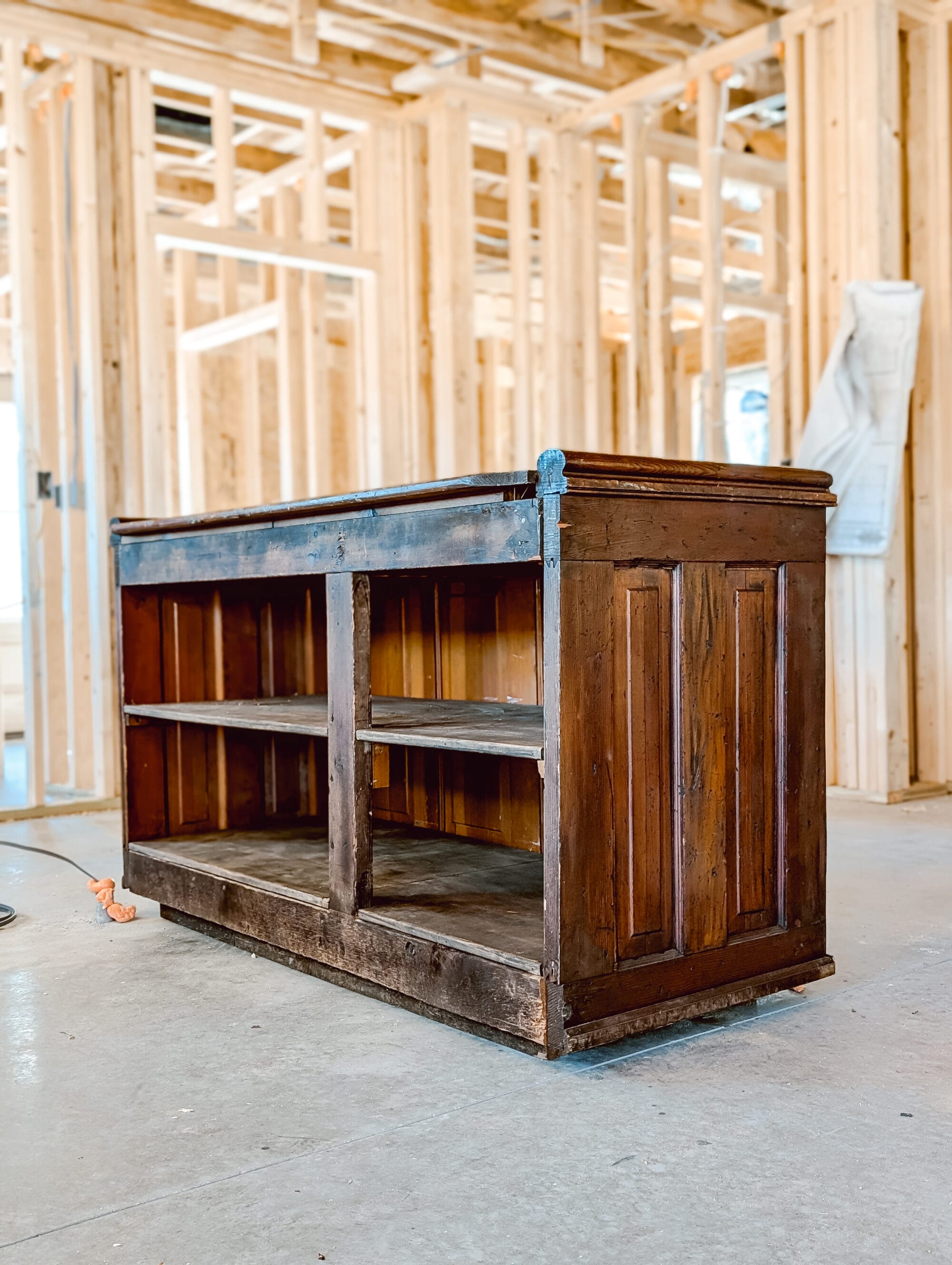 storage and shelves inside an antique general store counter
