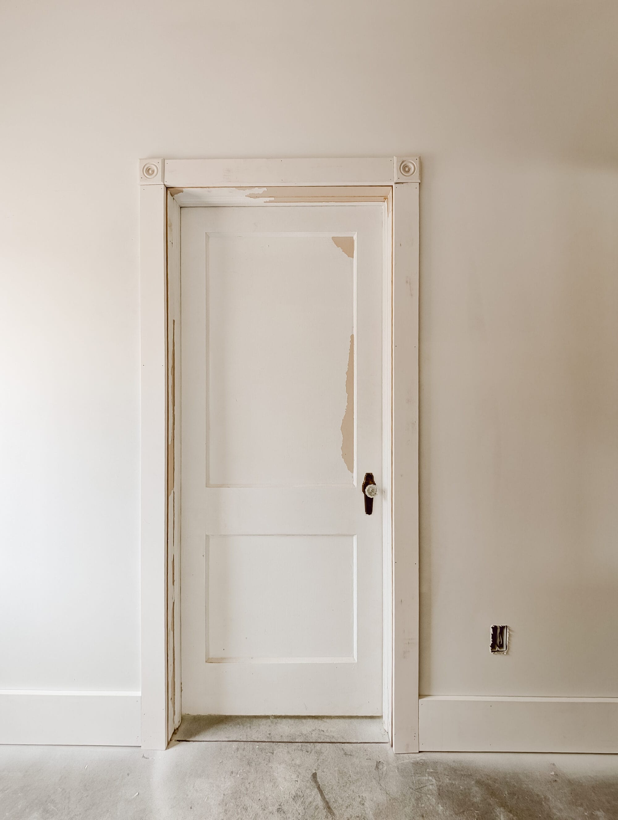 antique salvaged doors with brass and crystal door knobs