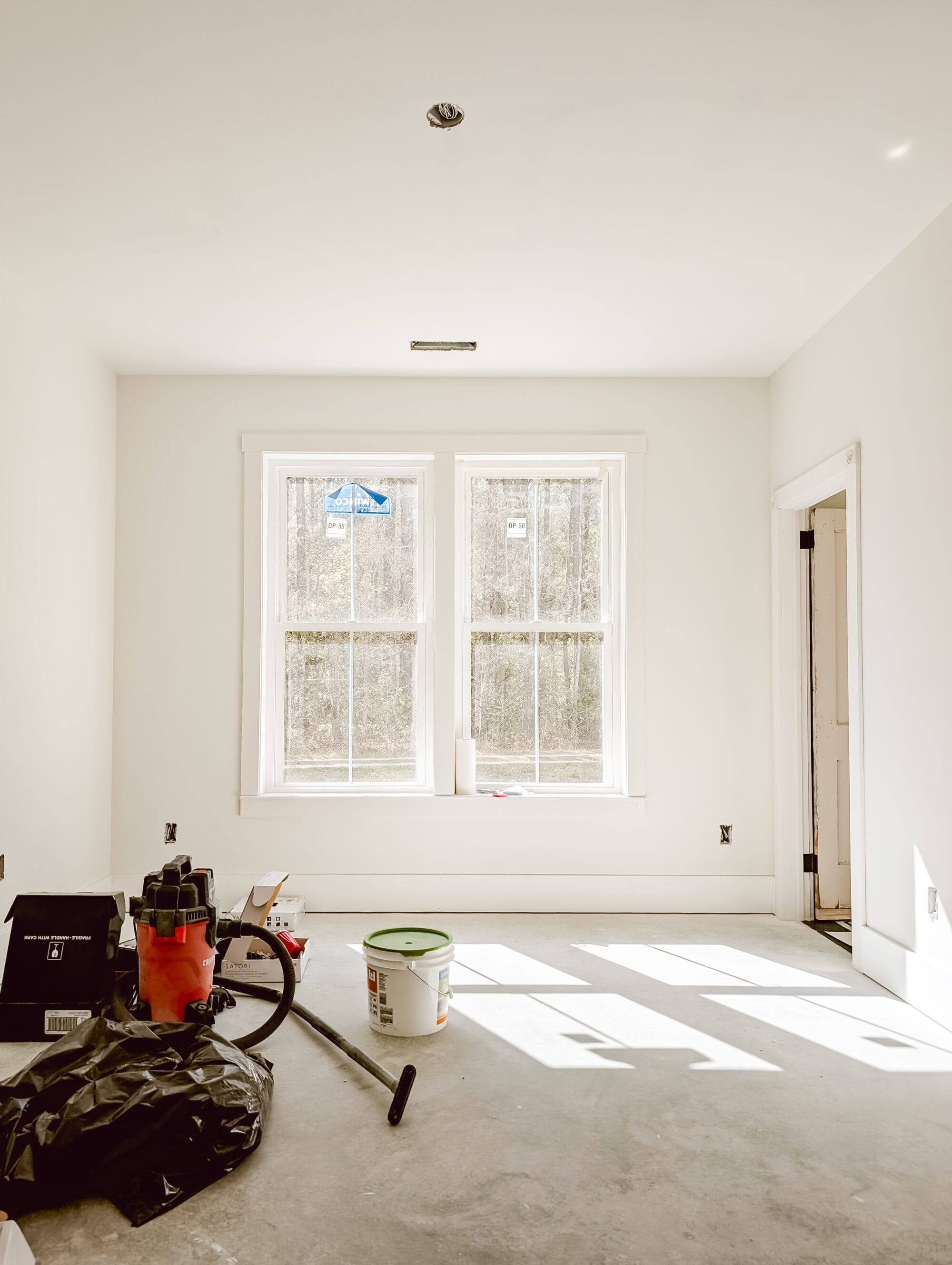 double windows in our unfinished cottage bedroom