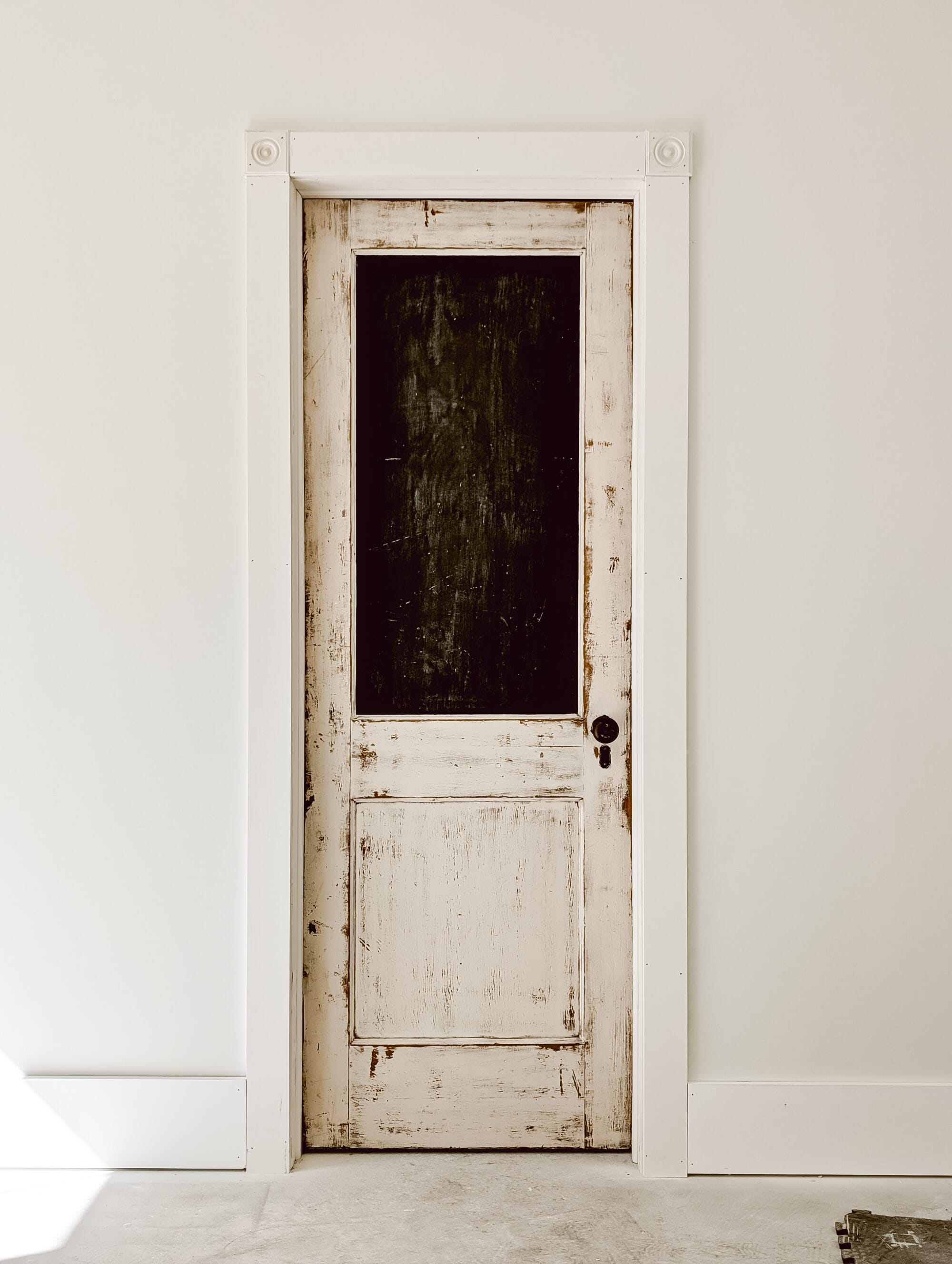 antique door leading to the walk-in closet