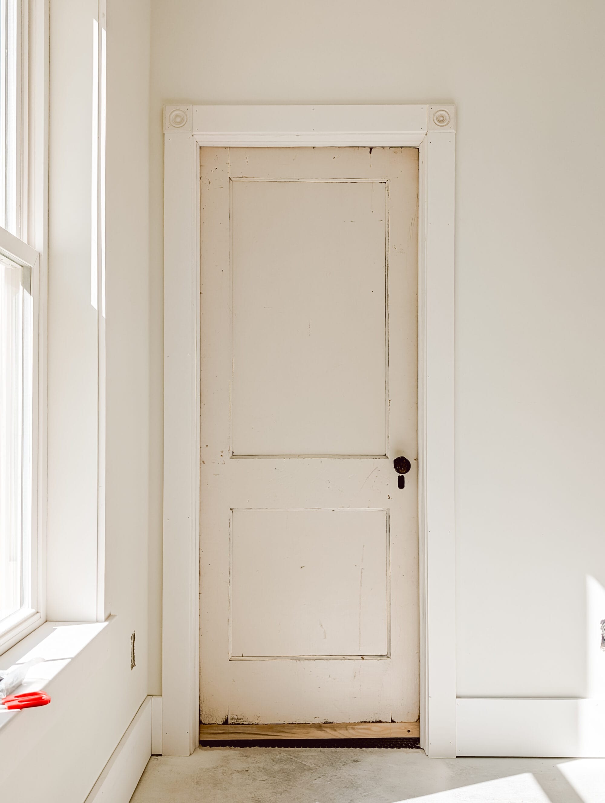 antique door leading to the bathroom