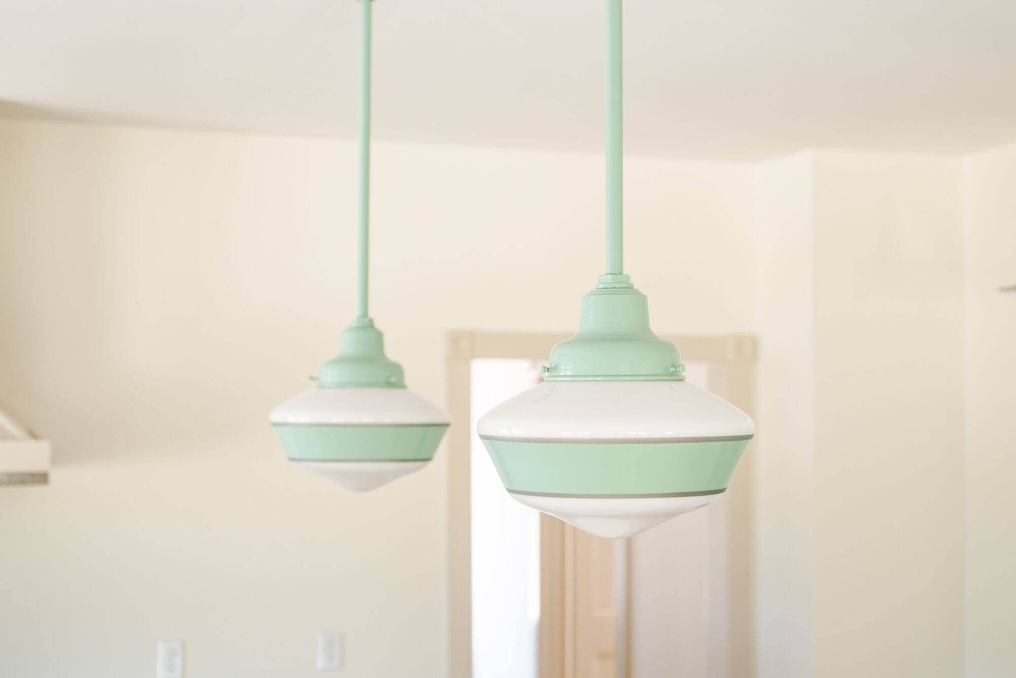 green and white primary schoolhouse pendant lights from Barn Light Electric