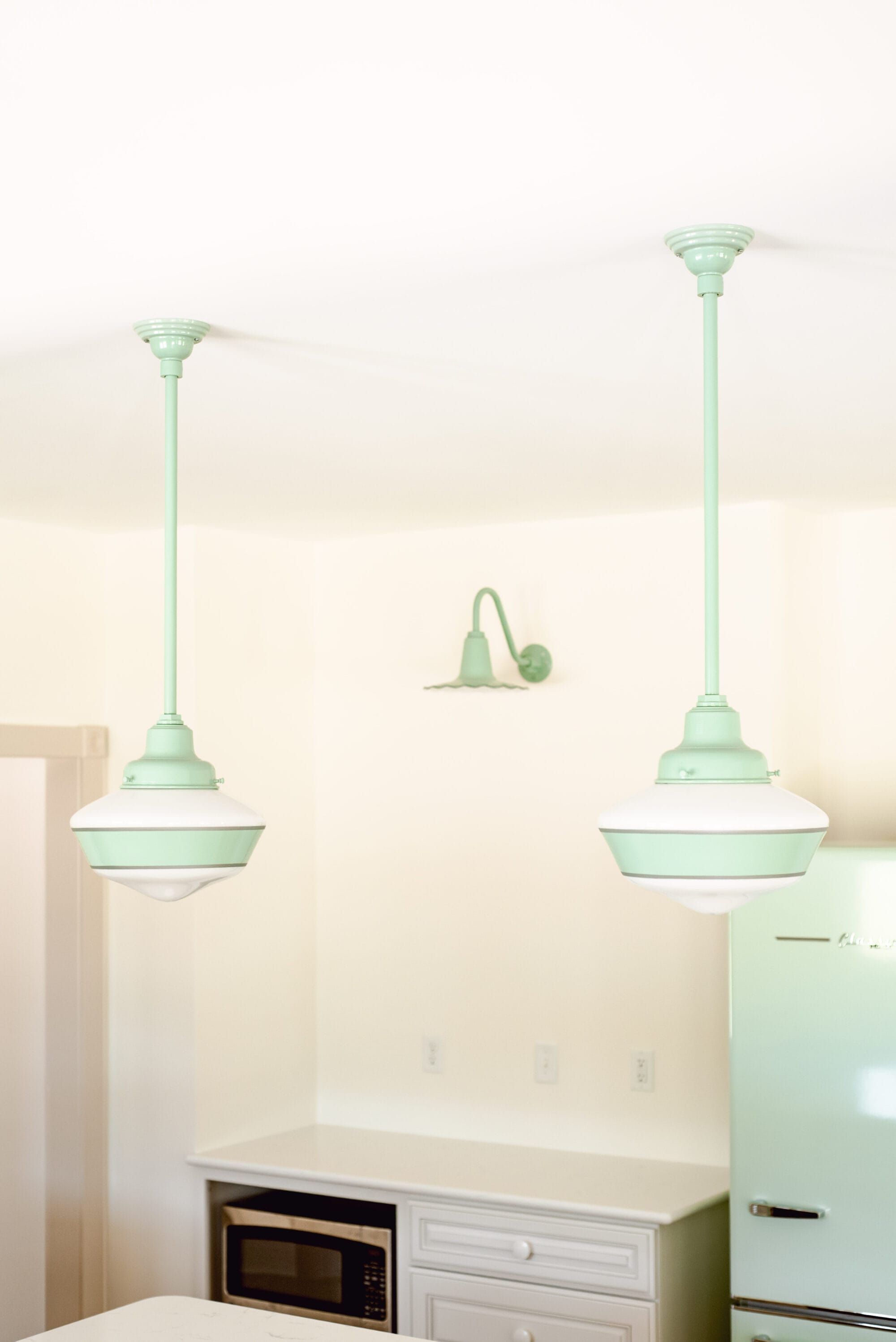 vintage style green and white primary schoolhouse pendant lights from Barn Light Electric