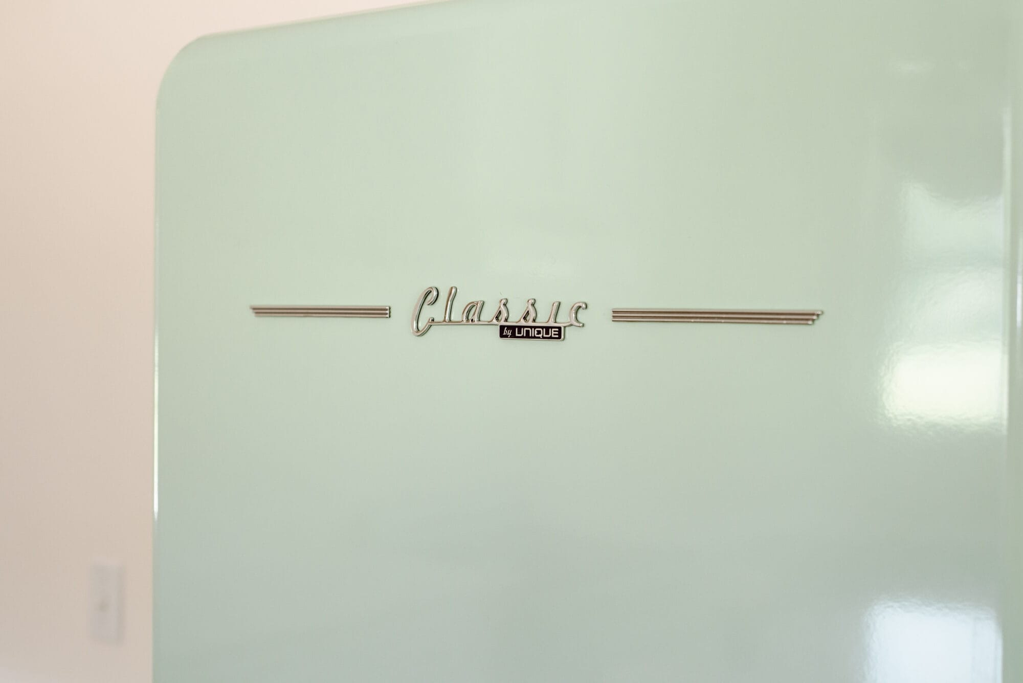 retro style mint green classic fridge from Unique Appliances