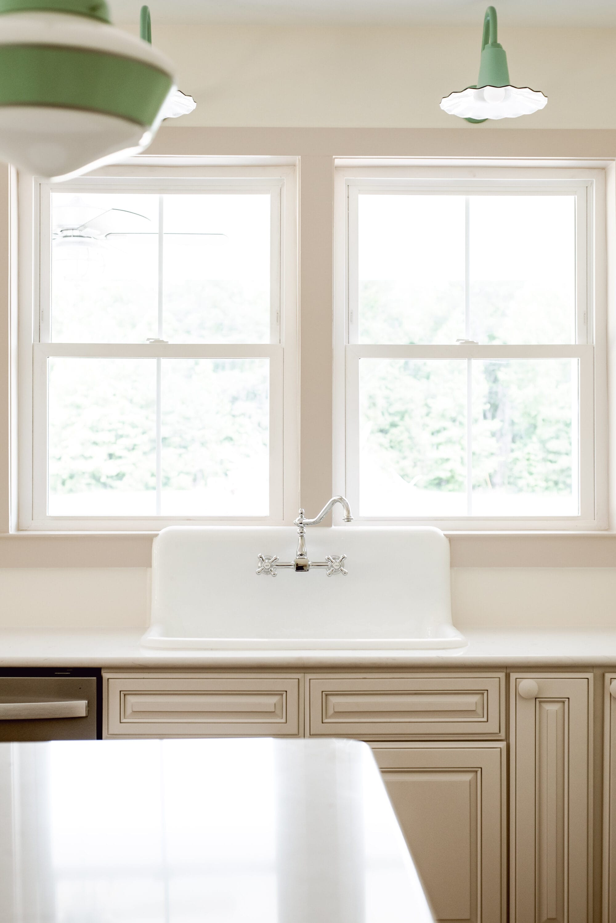 old fashioned, high back kitchen sink with vintage style chrome faucet
