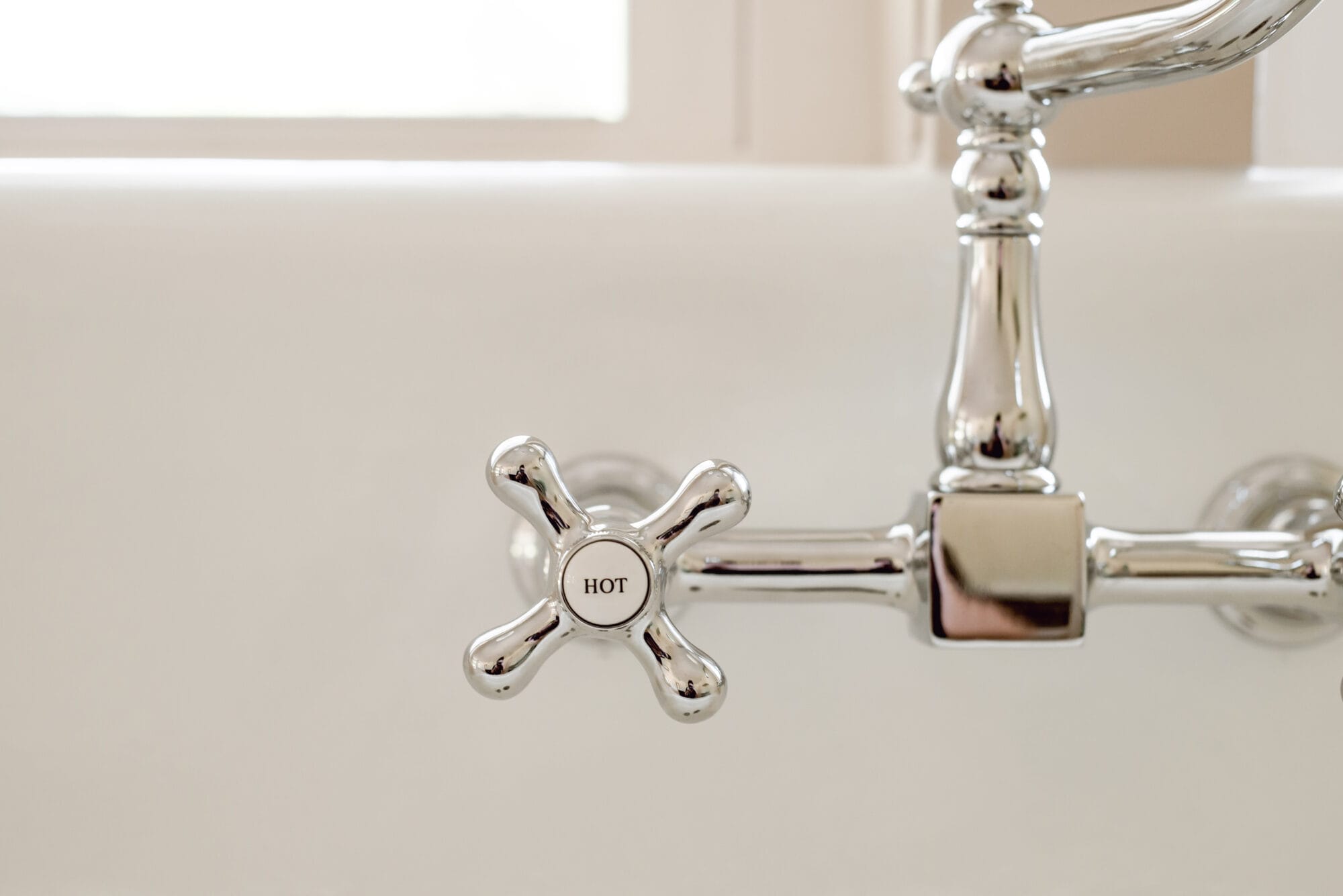 vintage style chrome kitchen faucet with "hot" water knob