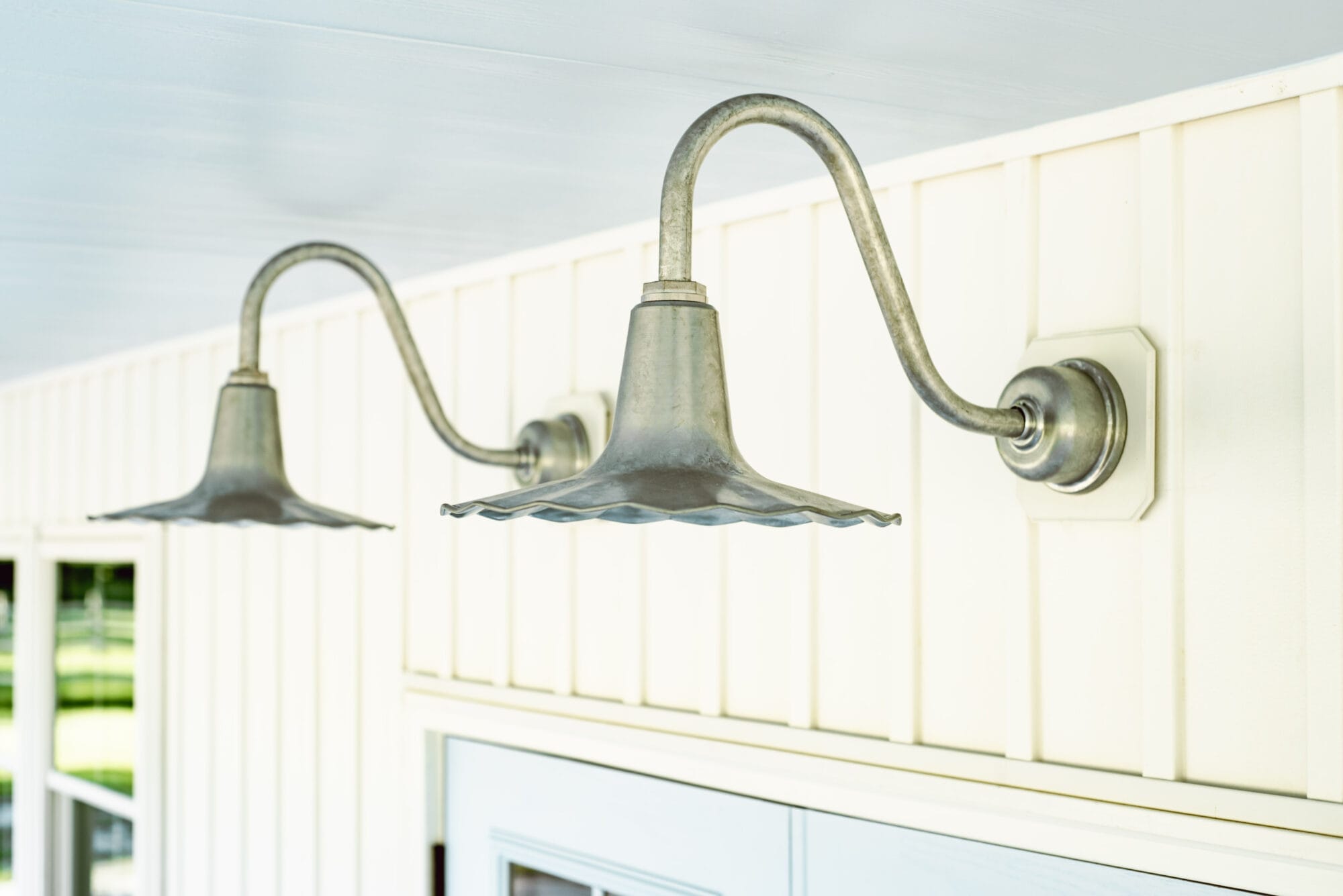 galvanized seaside gooseneck sconce lights from Barn Light Electric on the side porch
