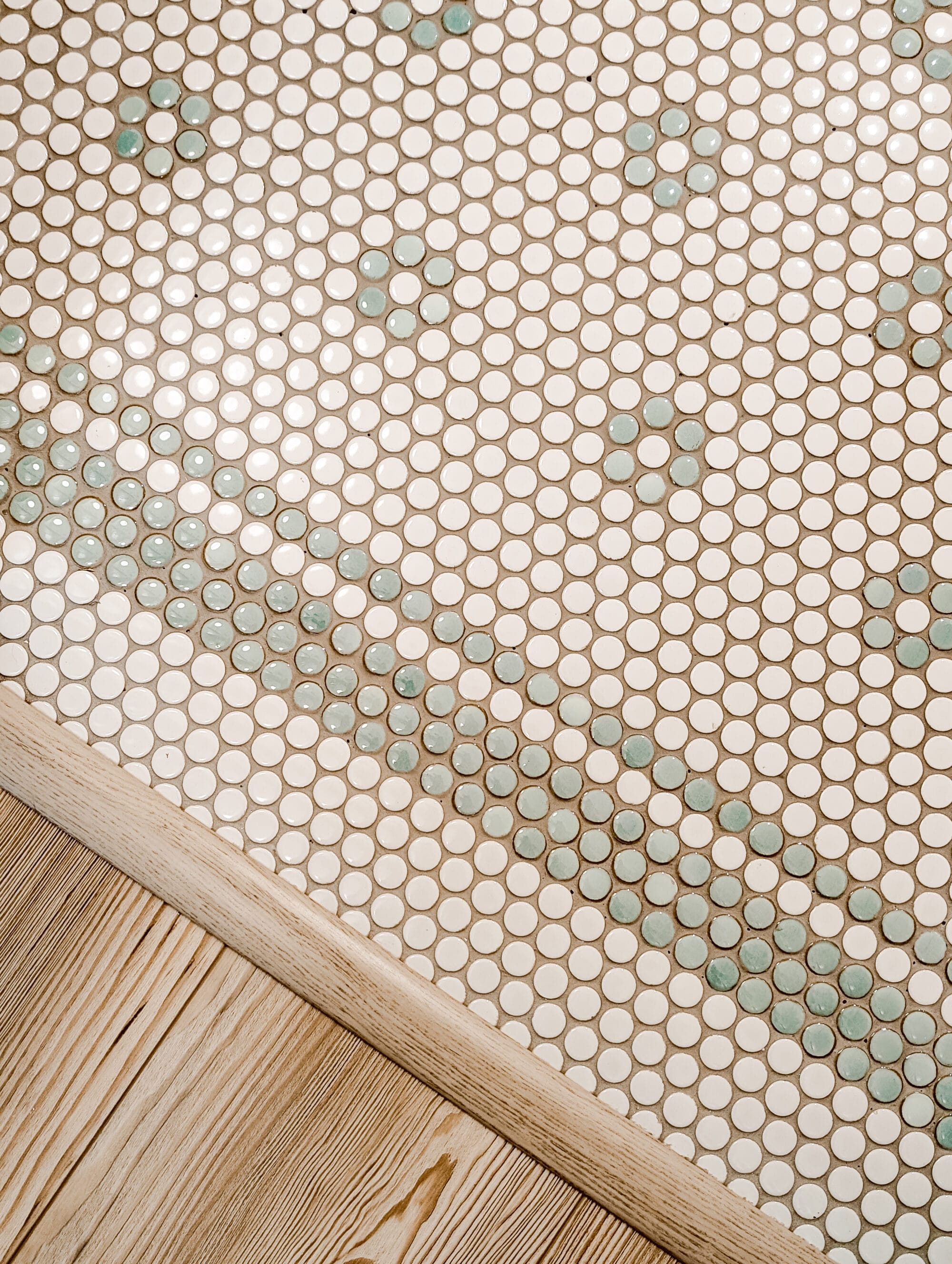 vintage inspired mint green and white penny tile floors in a daisy pattern