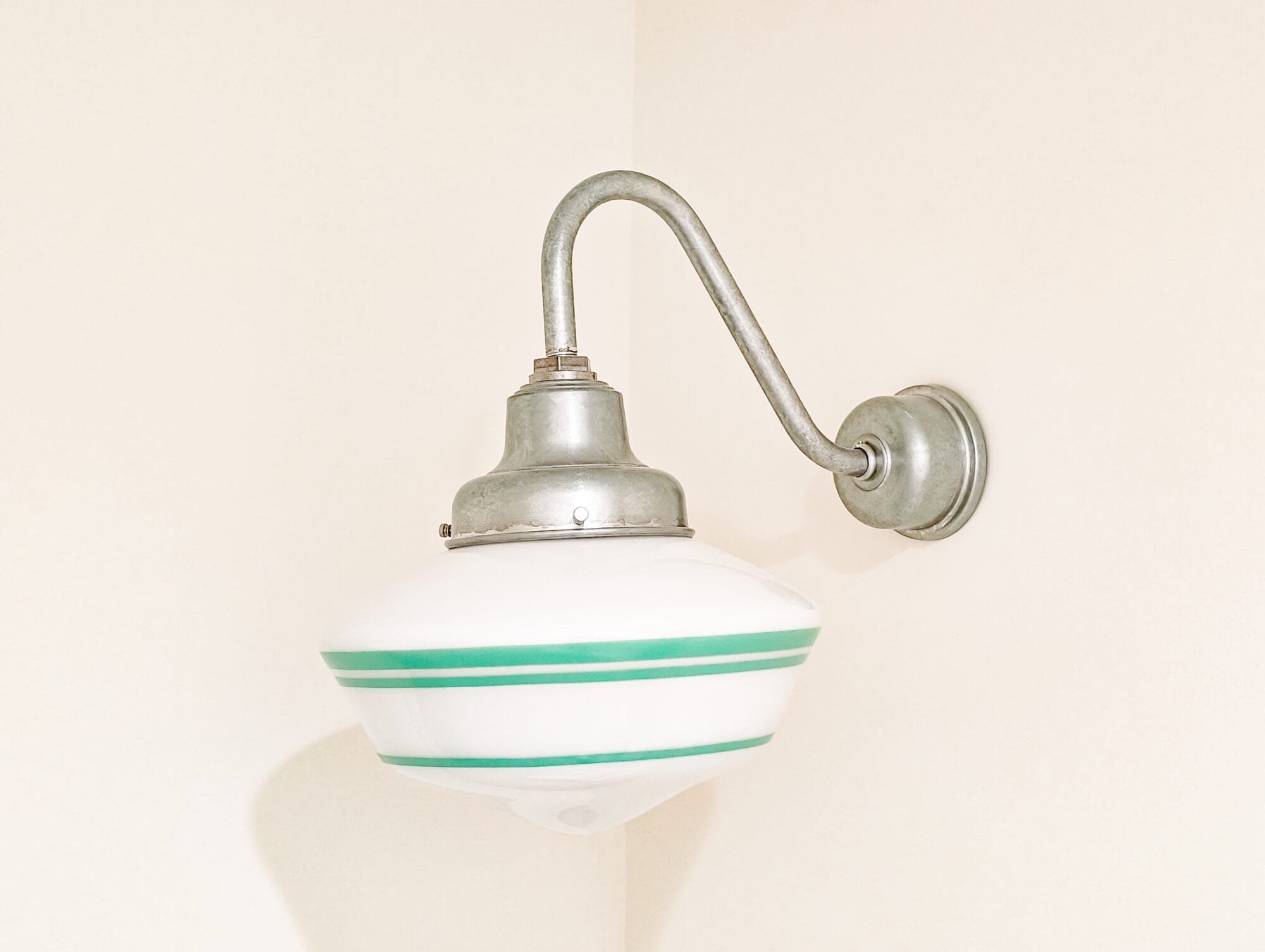 pretty vintage style schoolhouse light with galvanized gooseneck arm and jadeite stripes around the globe