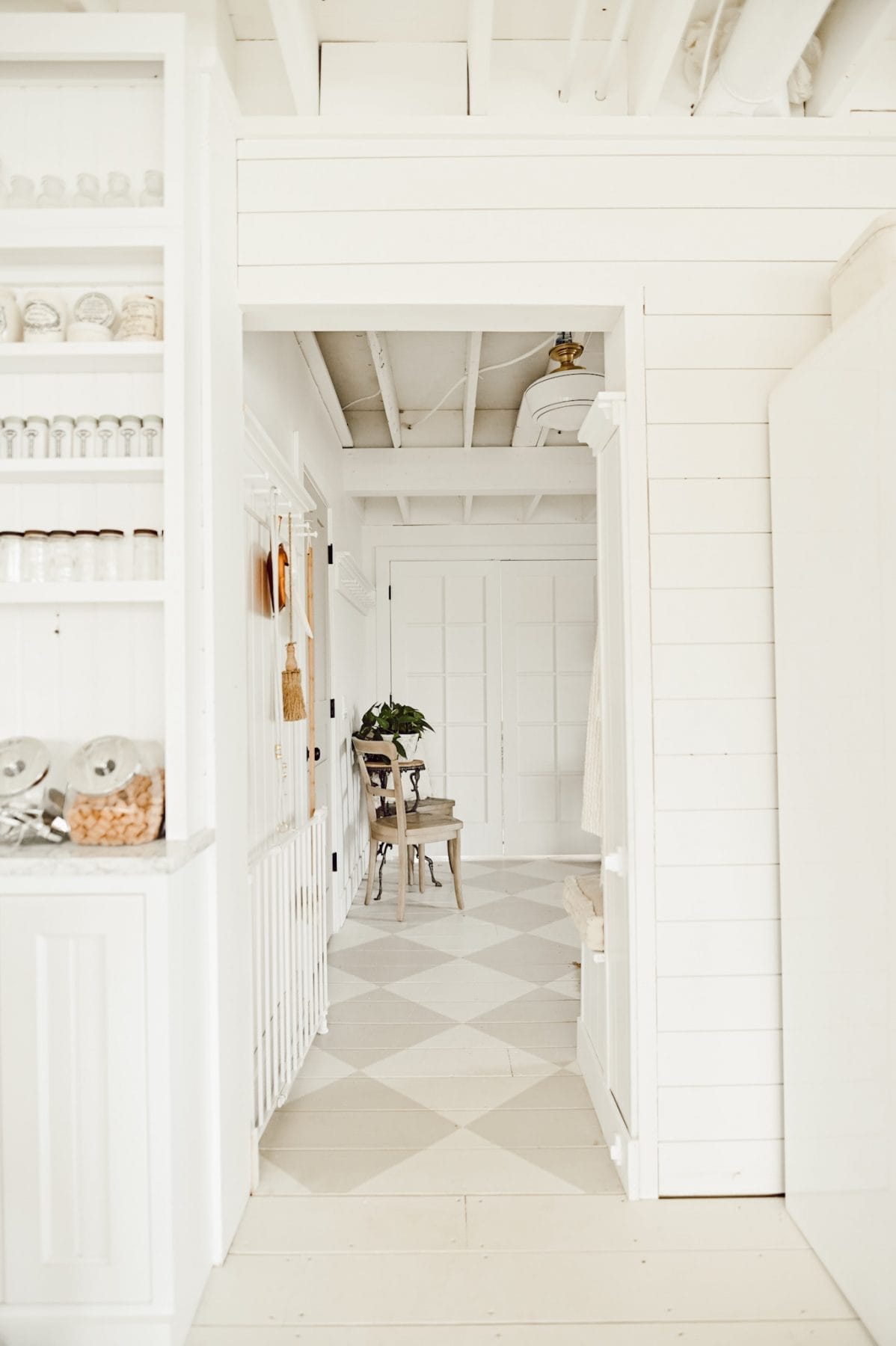 gray and white harlequin pattern painted wood floors