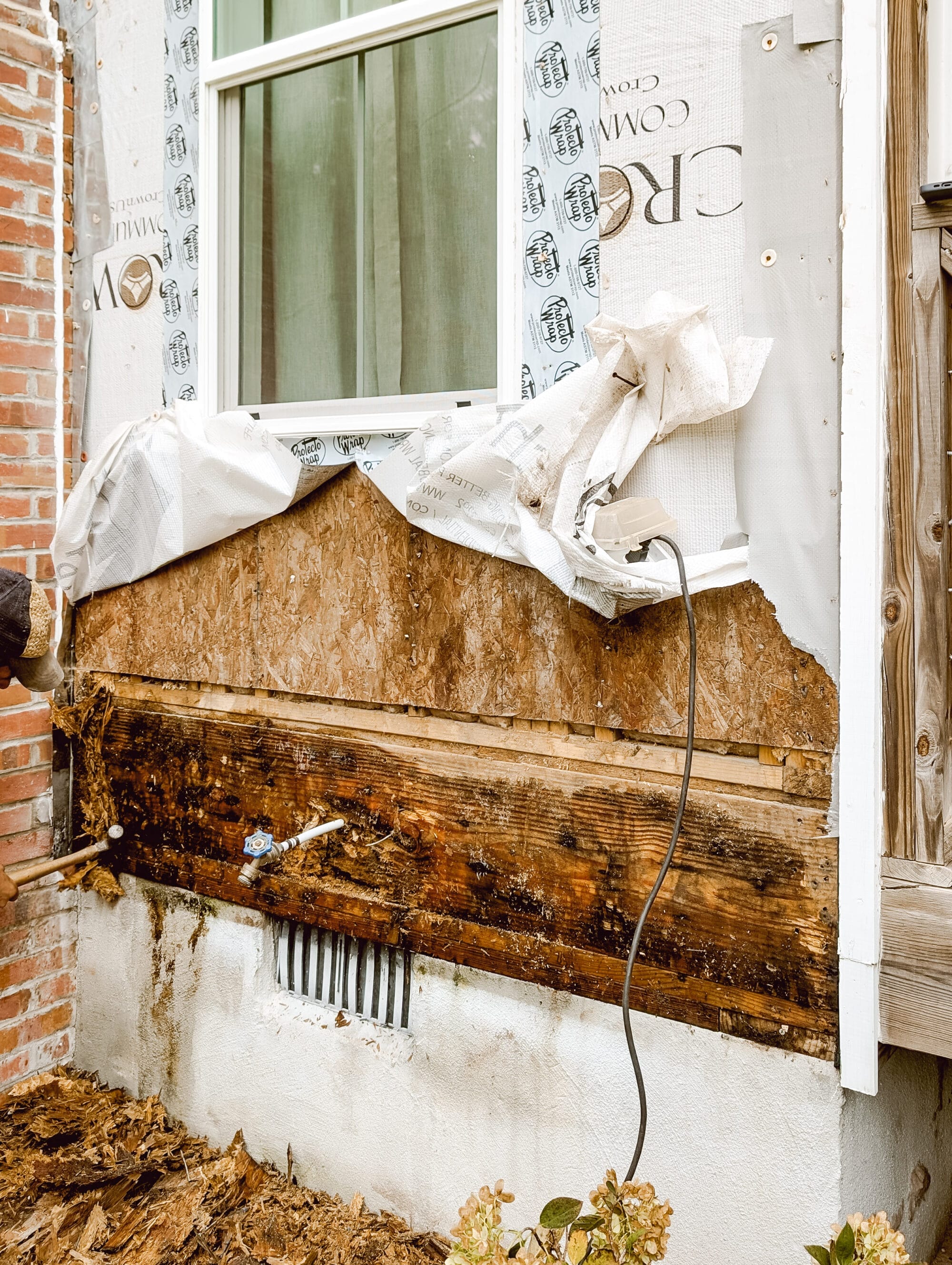 wood rot and water damage from a leaky pipe