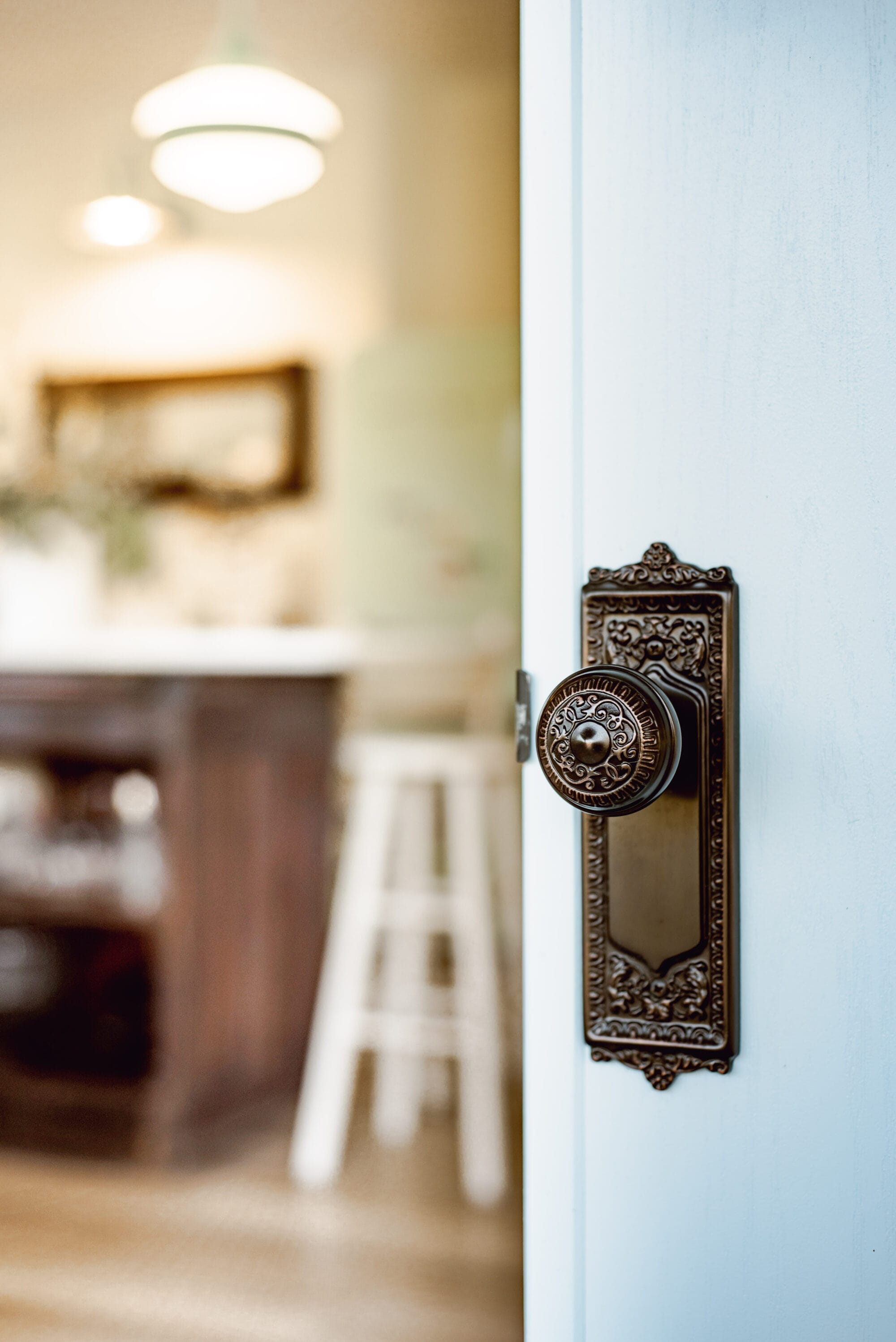 Egg & Dart style exterior door knobs from Nostalgic Warehouse in Timeless Bronze finish