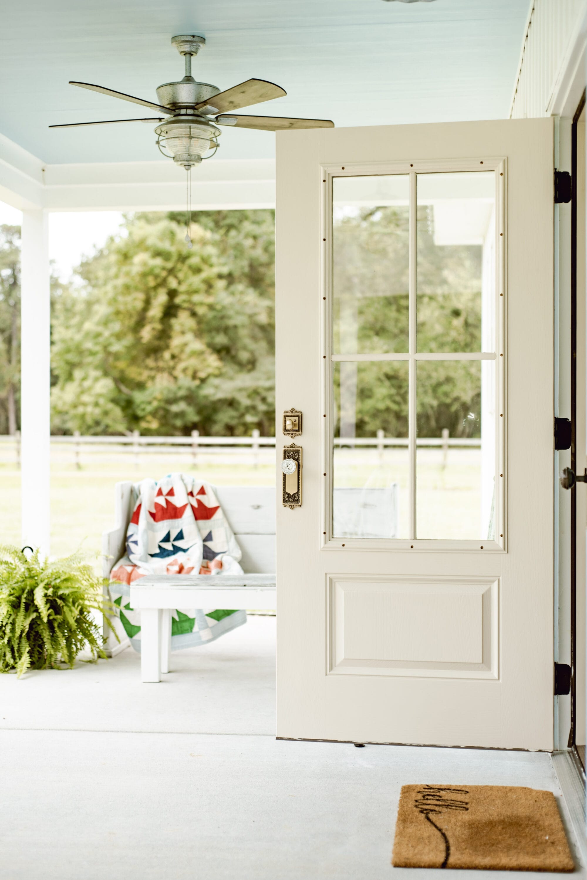 vintage style, split-finish door knob from Nostalgic Warehouse with Timeless Bronze on one side and Antique Brass and crystal on the other side