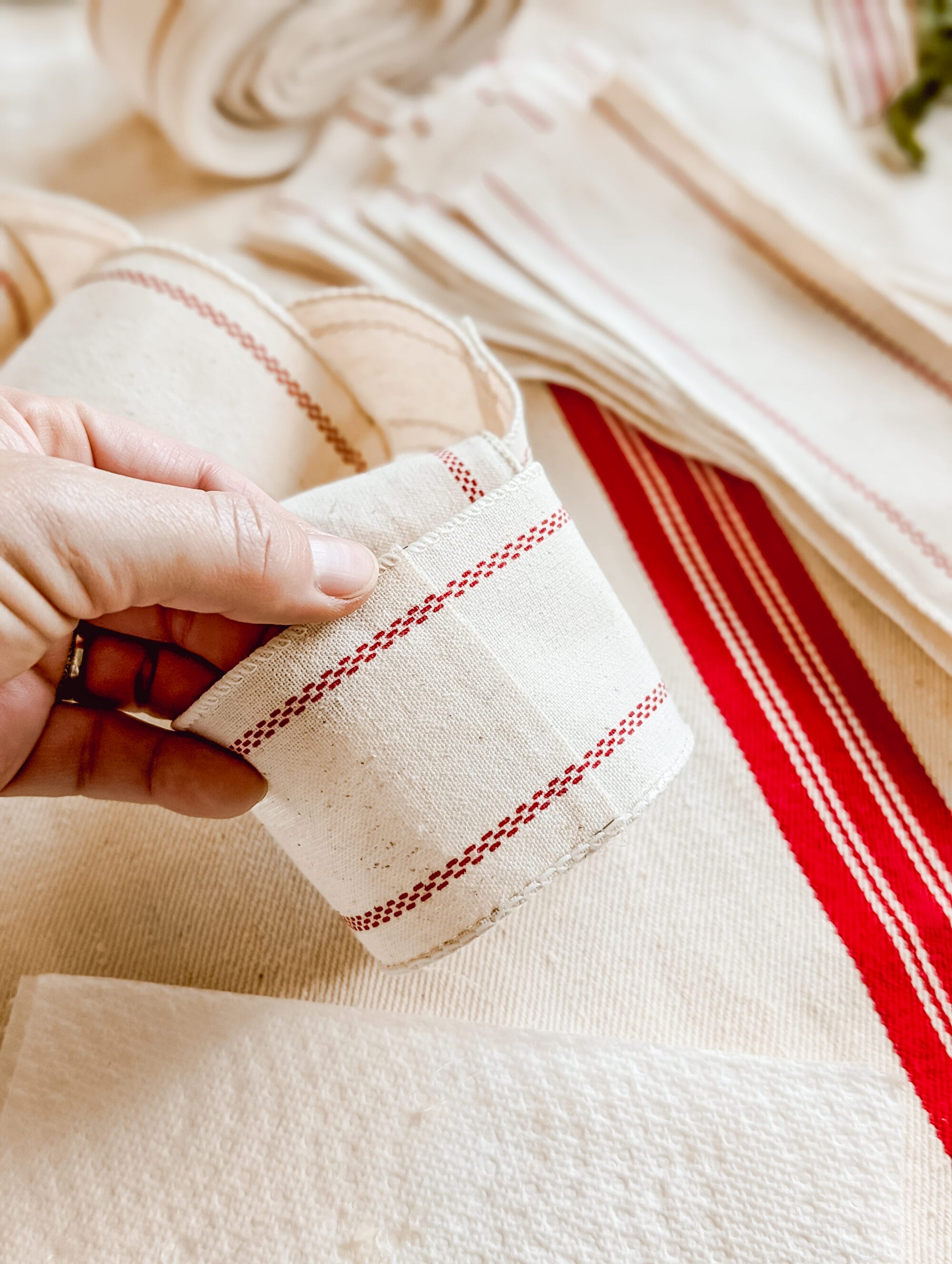 forming ribbon into circles to make a ribbon chain